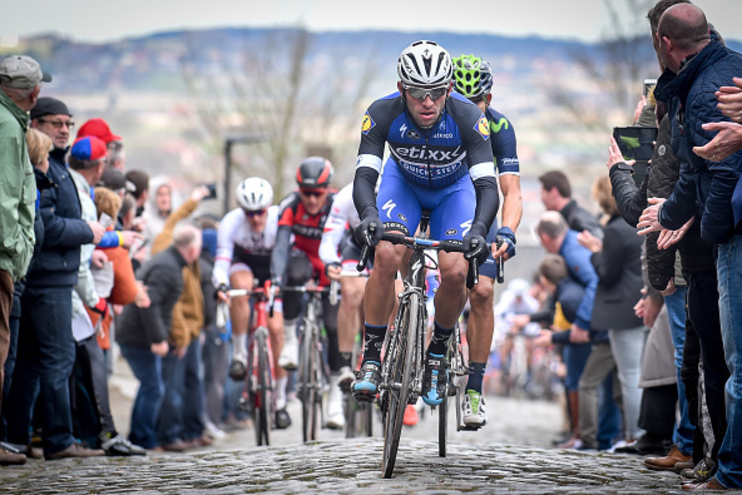 Colombian rider Fernando Gaviria of team Etixx - Quick-Step pedals through the Oude Kwaremont during the 71st edition of the 'Dwars Door Vlaanderen' cycling race, 199,7 km from Roeselare to Waregem, on March 23, 2016.
The sporting world was quick to expre