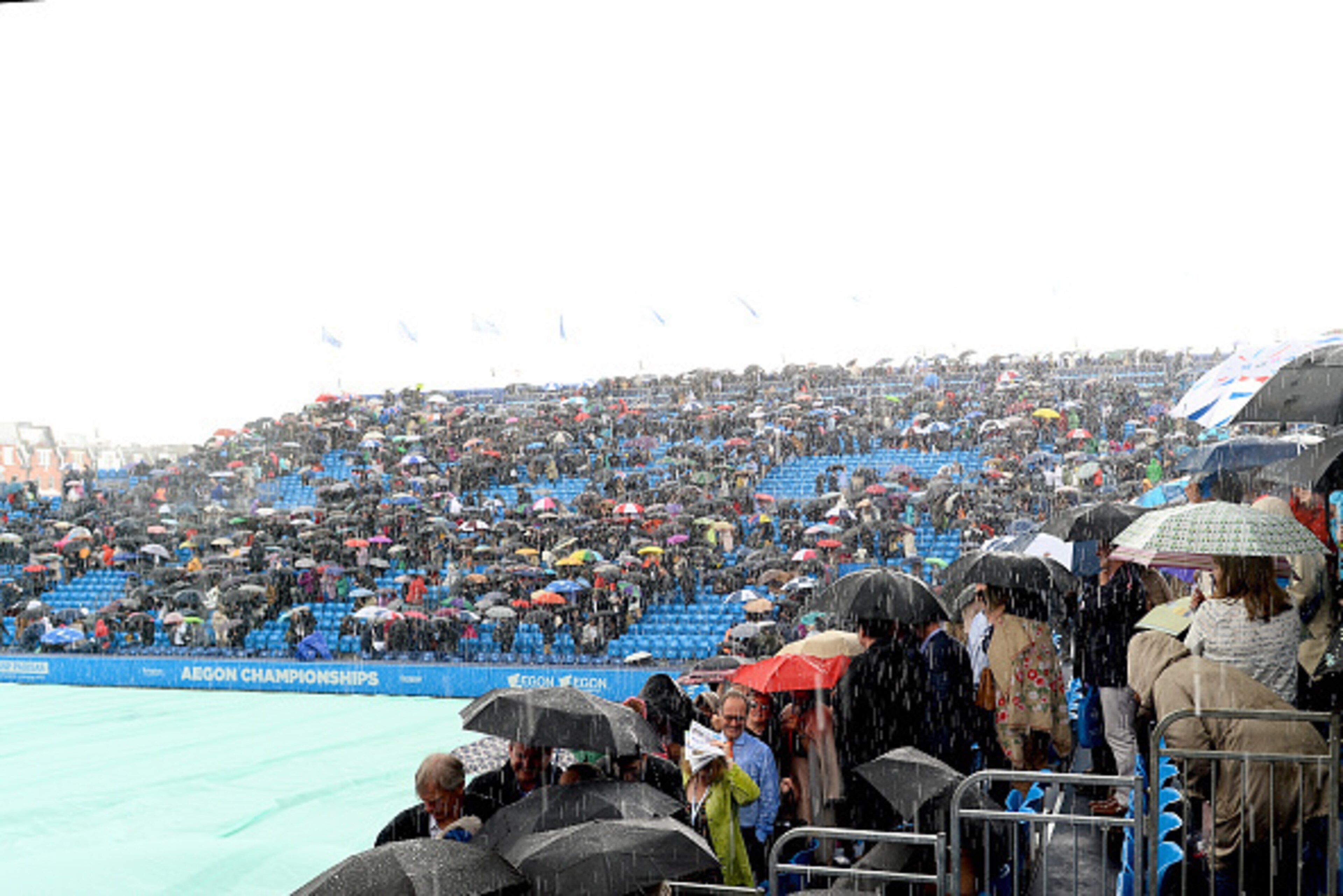 LONDON, ENGLAND - JUNE 14: Heavy rain stops play in the match between Stan Wawrinka of Switzerland and Fernando Verdasco of Spain on day 2 at Queens Club on June 14, 2016 in London, England. (Photo by Patrik Lundin/Getty Images)