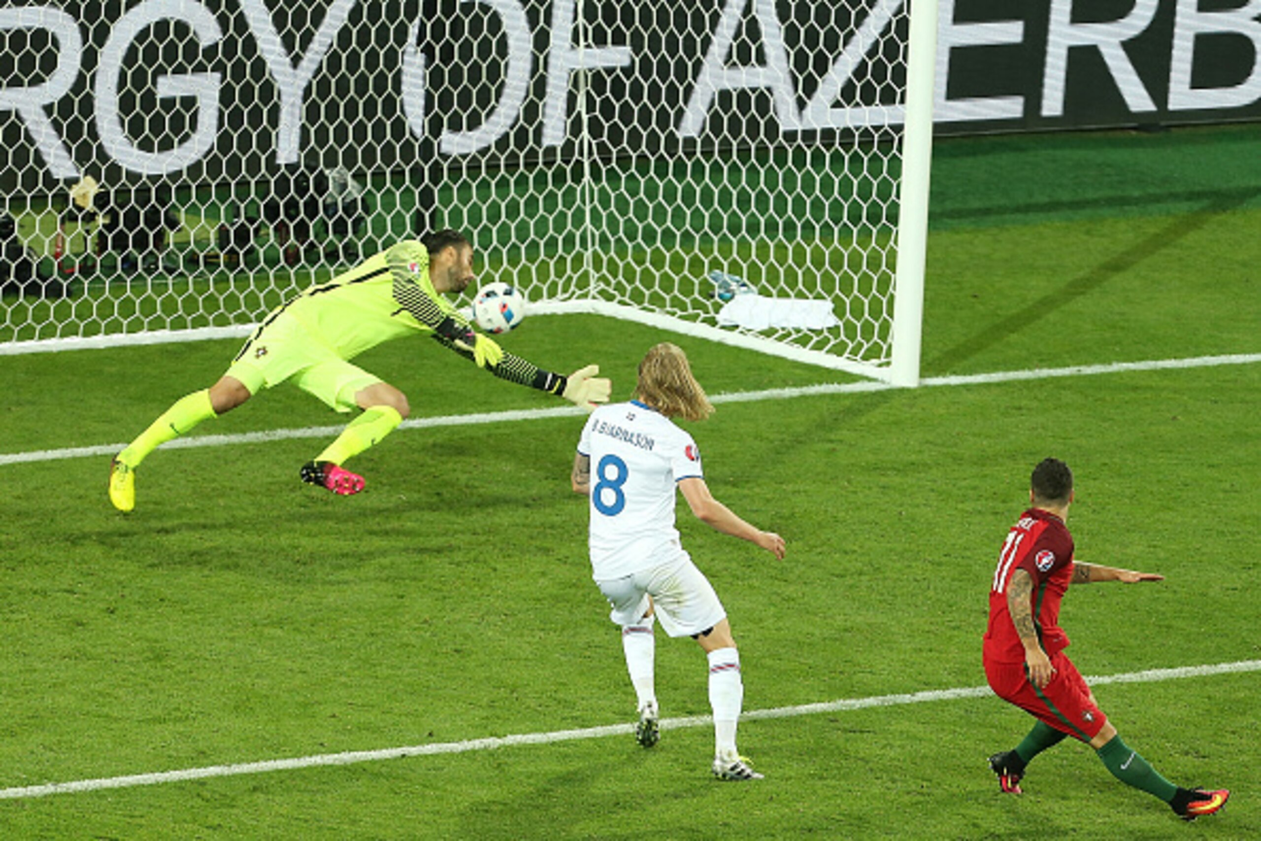 SAINT-ETIENNE, FRANCE - JUNE 14: Bjirkir Bjarnason of Iceland scores a goal to make the score 1-1 during the UEFA EURO 2016 Group F match between Portugal and Iceland at Stade Geoffroy-Guichard on June 14, 2016 in Saint-Etienne, France. (Photo by Cather SAINT-ETIENNE, FRANCE - JUNE 14: Bjirkir Bjarnason of Iceland scores a goal to make the score 1-1 during the UEFA EURO 2016 Group F match between Portugal and Iceland at Stade Geoffroy-Guichard on June 14, 2016 in Saint-Etienne, France. (Photo by Cather