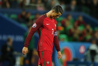 SAINT-ETIENNE, FRANCE - JUNE 14:  Cristiano Ronaldo of Portugal reacts during the UEFA EURO 2016 Group F match between Portugal and Iceland at Stade Geoffroy-Guichard on June 14, 2016 in Saint-Etienne, France.  (Photo by Matthew Ashton - AMA/Getty Images)