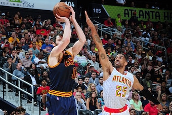 ATLANTA, GA - MAY 8: Kevin Love #0 of the Cleveland Cavaliers shoots against Thabo Sefolosha #25 of the Atlanta Hawks during Game Three of the Eastern Conference Semifinals during the 2016 NBA Playoffs on May 8, 2016 at Philips Arena in Cleveland, Ohio. N