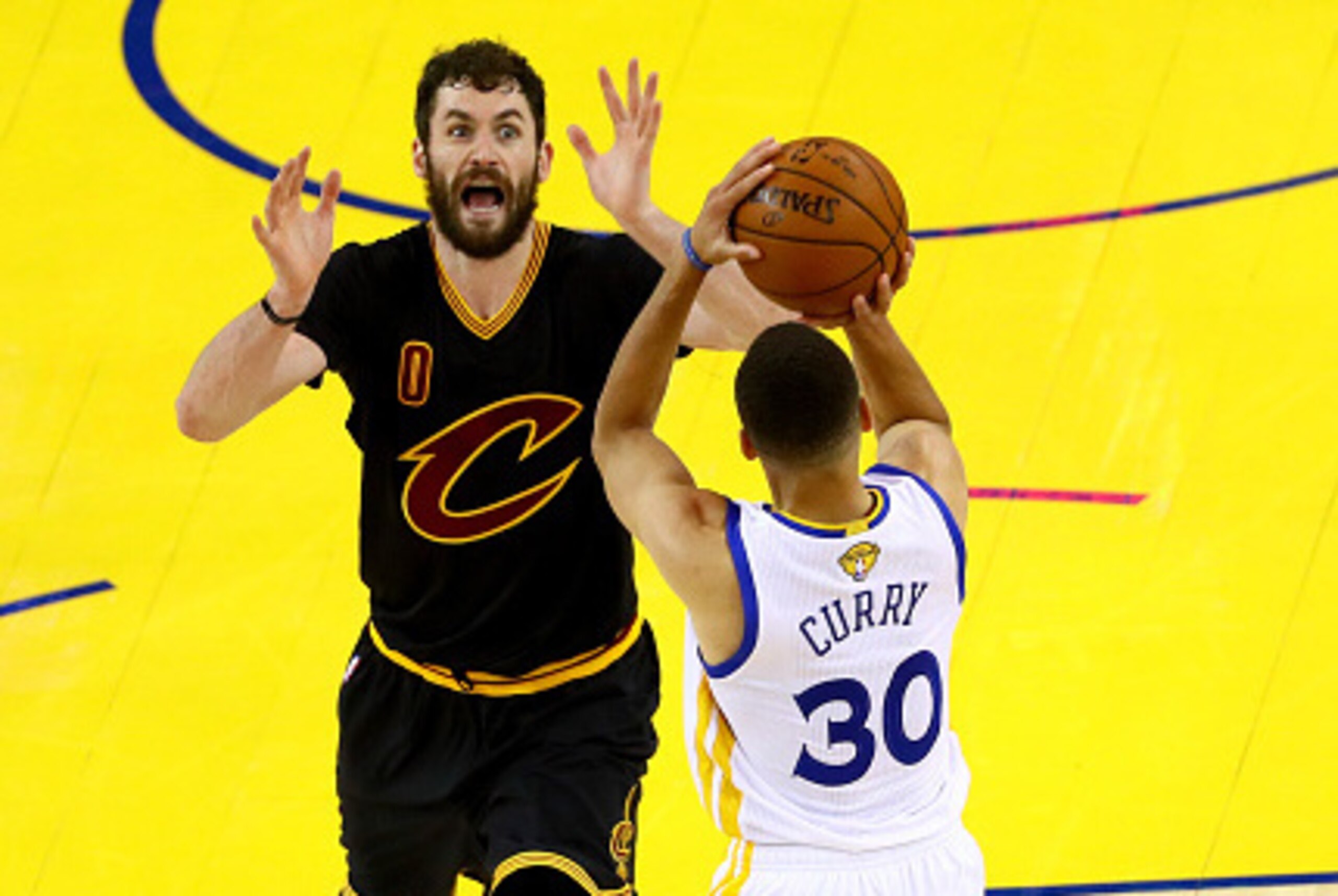 OAKLAND, CA - JUNE 13:  Stephen Curry #30 of the Golden State Warriors shoots the ball against Kevin Love #0 of the Cleveland Cavaliers during the second half in Game 5 of the 2016 NBA Finals at ORACLE Arena on June 13, 2016 in Oakland, California. NOTE T