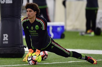 Guillermo Ochoa goalkeeper of Mexico warms up during a traning session at Methodist Training Center in Houston, Texas, on June 12, 2016. 
Mexico will face Venezuela on June 13 in their third match of the Copa America. / AFP / ALFREDO ESTRELLA        (Phot