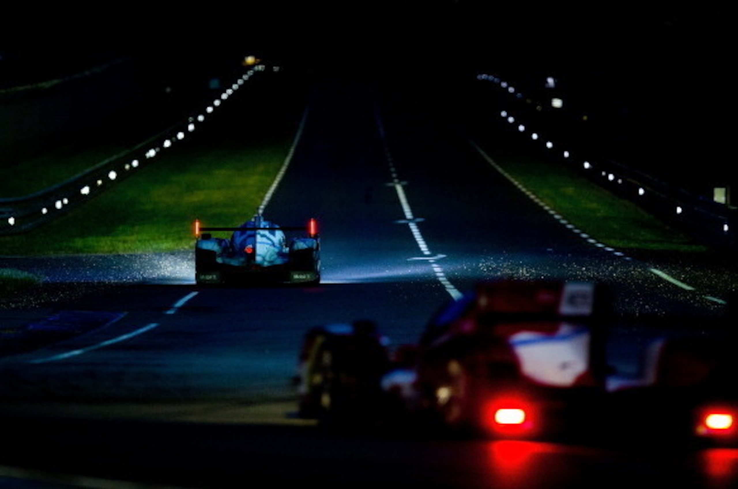 LE MANS, FRANCE - JUNE 15: Porsche 919 Hybrid, Porsche Team: Romain Dumas, Neel Jani, Marc Lieb in action during the Le Mans 24 Hour Race at Circuit de la Sarthe on June 15, 2014 in Le Mans, France.  (Photo by Vladimir Rys Photography via Getty Images)