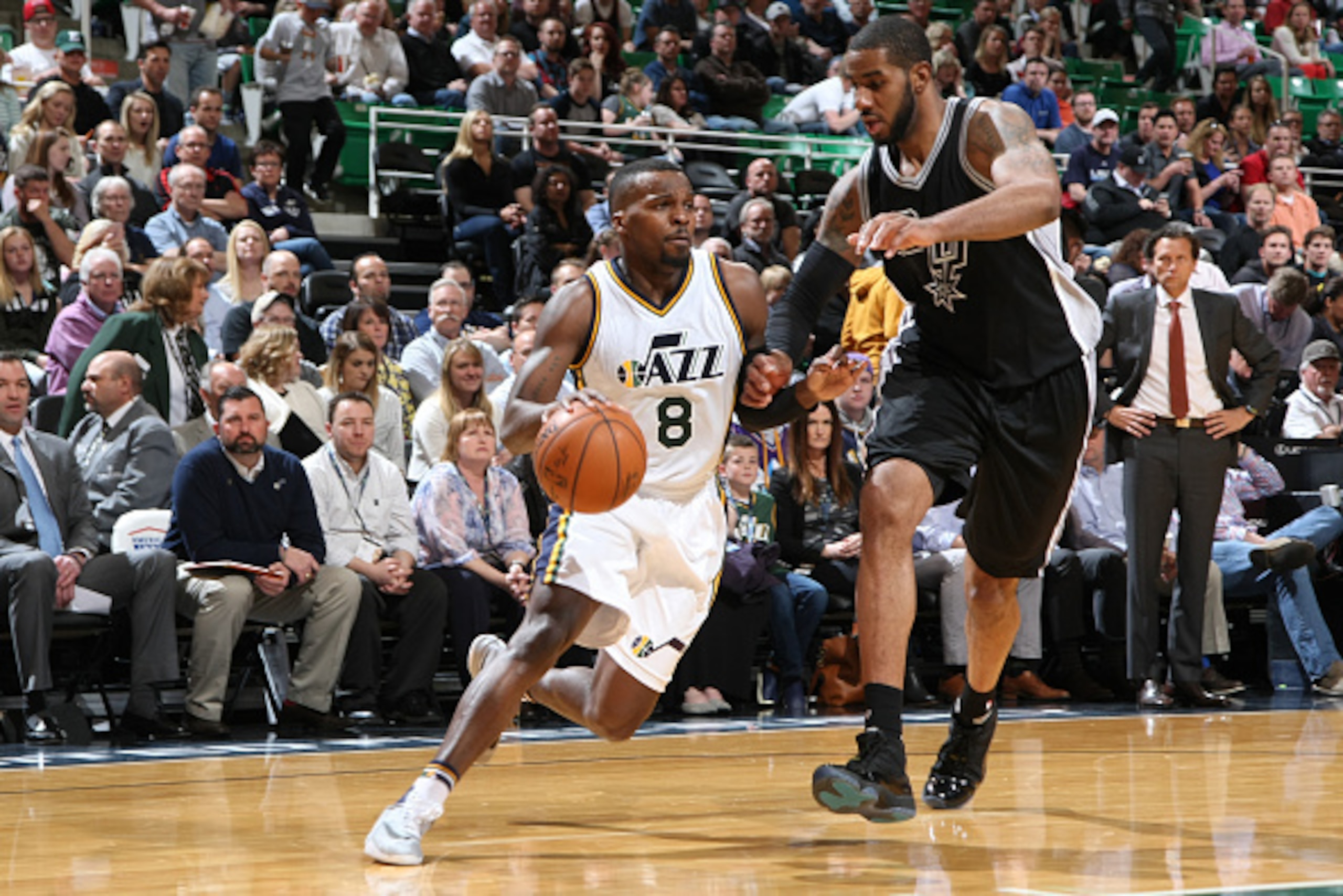 SALT LAKE CITY, UT  - APRIL 5: Shelvin Mack #8 of the Utah Jazz drives to the basket against the San Antonio Spurs during the game on April 5, 2016 at Vivint Smart Home Arena in Salt Lake City, Utah. NOTE TO USER: User expressly acknowledges and agrees th