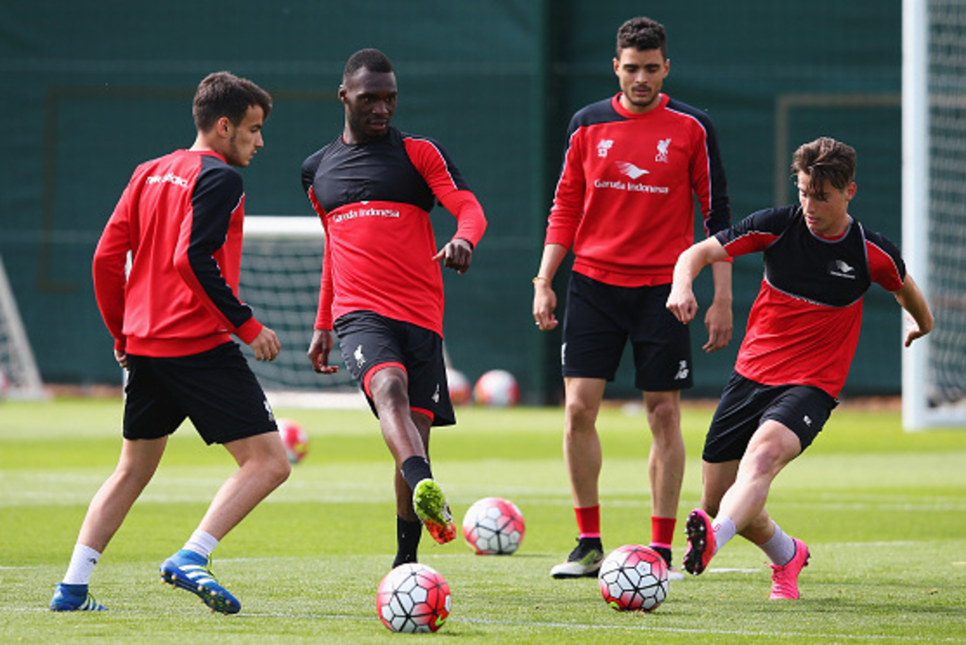 LIVERPOOL, ENGLAND - MAY 13: Christian Benteke of Liverpool passes during a training session at the Liverpool UEFA Europa League Cup Final Media Day at Melwood Training Ground on May 13, 2016 in Liverpool, England. (Photo by Alex Livesey/Getty Images) LIVERPOOL, ENGLAND - MAY 13: Christian Benteke of Liverpool passes during a training session at the Liverpool UEFA Europa League Cup Final Media Day at Melwood Training Ground on May 13, 2016 in Liverpool, England. (Photo by Alex Livesey/Getty Images)