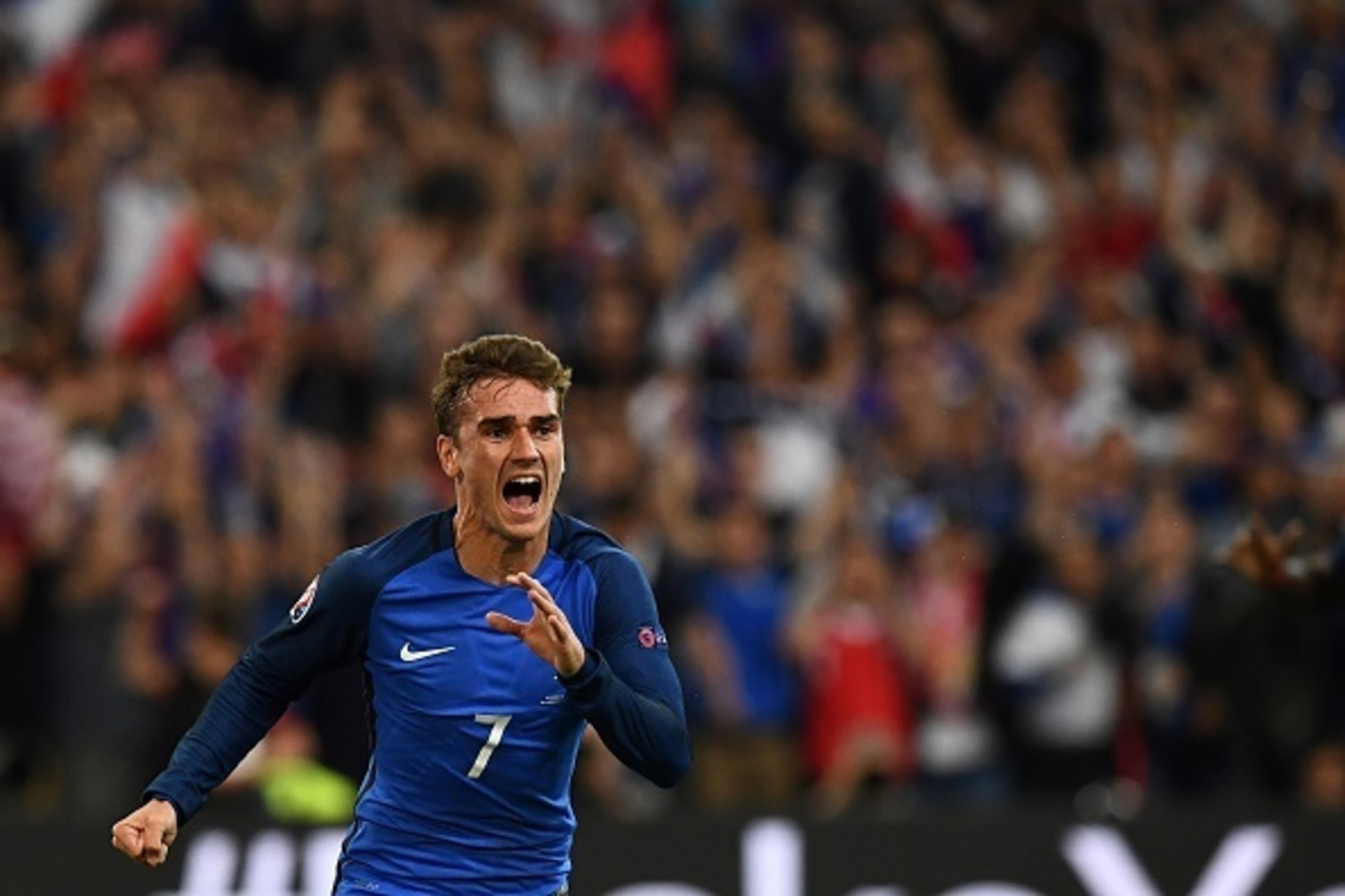 France's forward Antoine Griezmann reacts after scoring France's first goal during the Euro 2016 group A football match between France and Albania at the Velodrome stadium in Marseille on June 15, 2016.
France beat Albania 2-0. / AFP / FRANCK FIFE France's forward Antoine Griezmann reacts after scoring France's first goal during the Euro 2016 group A football match between France and Albania at the Velodrome stadium in Marseille on June 15, 2016.
France beat Albania 2-0. / AFP / FRANCK FIFE