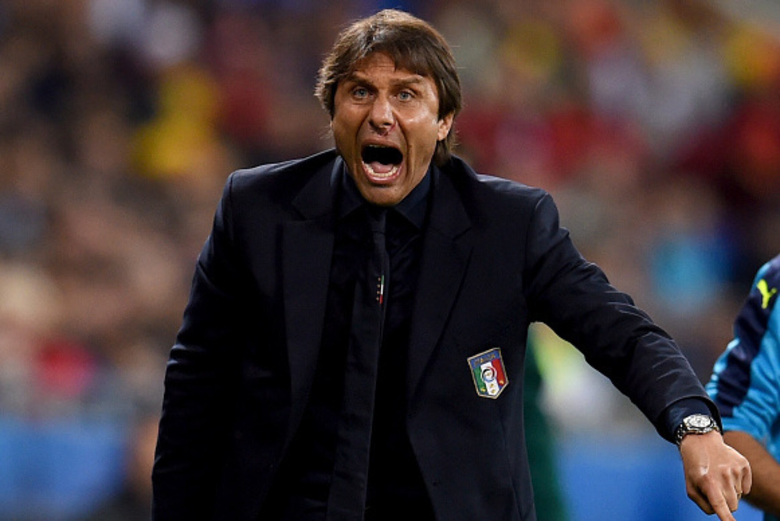 Antonio Conte head coach of Italy gestures during the UEFA EURO 2016 Group E match between Belgium and Italy at Stade des Lumieres on June 13, 2016 in Lyon, France.