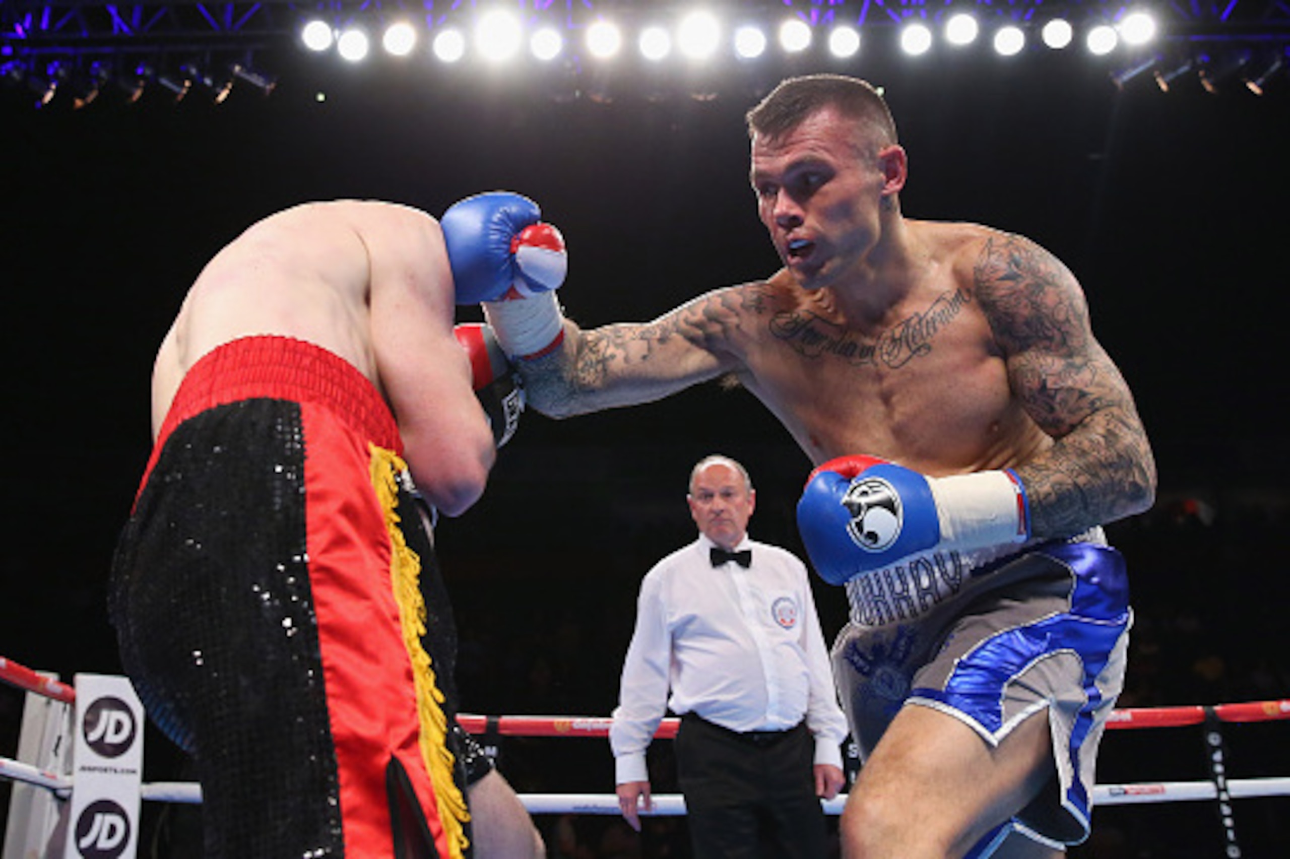 MANCHESTER, ENGLAND - MAY 07:  Martin Murray lands a right shot on Cedric Spera during the Super-Middleweight Contest between Martin Murray and Cedric Spera at Manchester Arena on May 07, 2016 in Manchester, England.  (Photo by Alex Livesey/Getty Images)