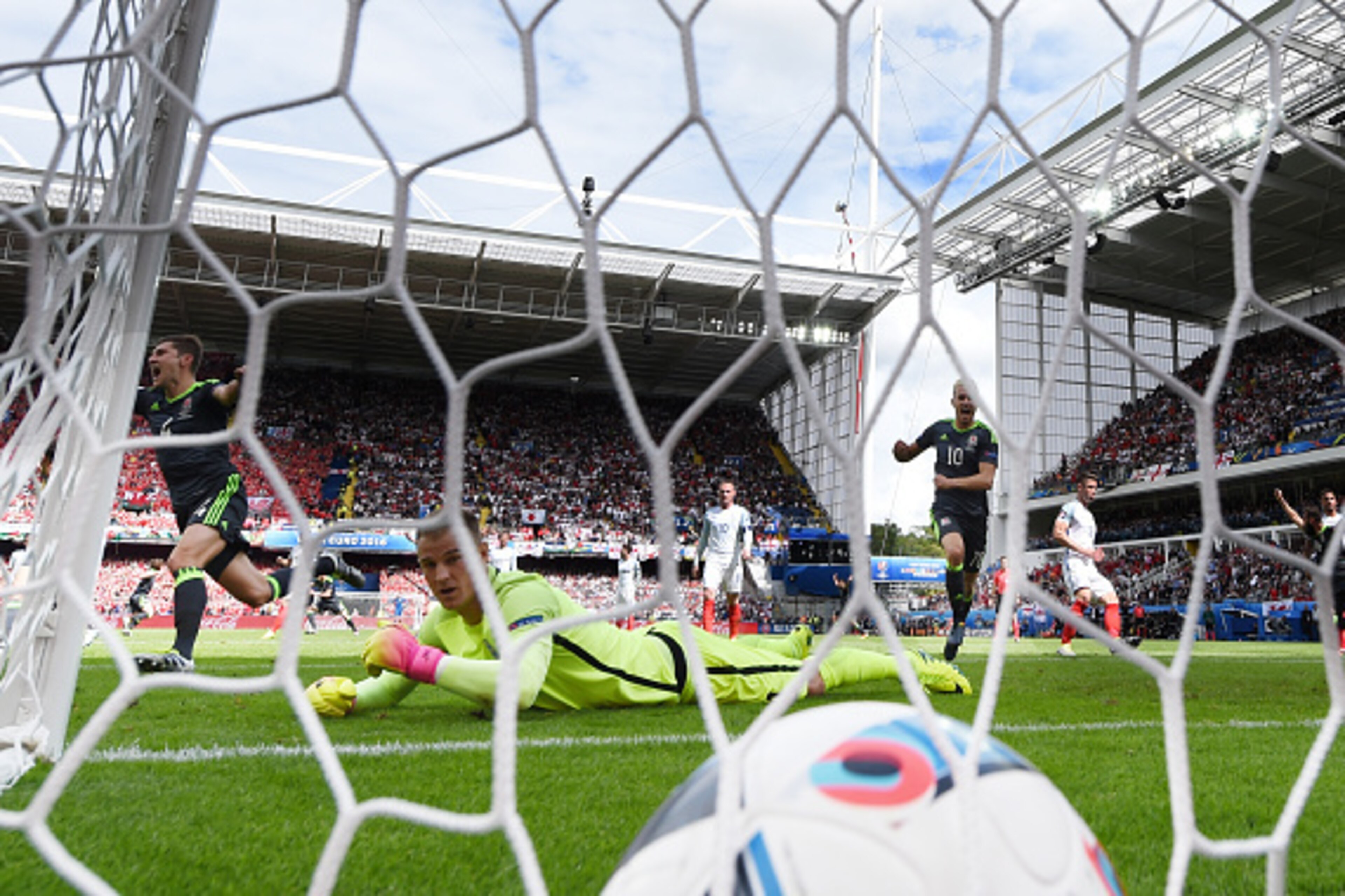 LENS, FRANCE - JUNE 16:  Joe Hart of England watches the ball in the back of the net as he fails to stop the shot by Gareth Bale of Wales allowing the first goal during the UEFA EURO 2016 Group B match between England and Wales at Stade Bollaert-Delelis o