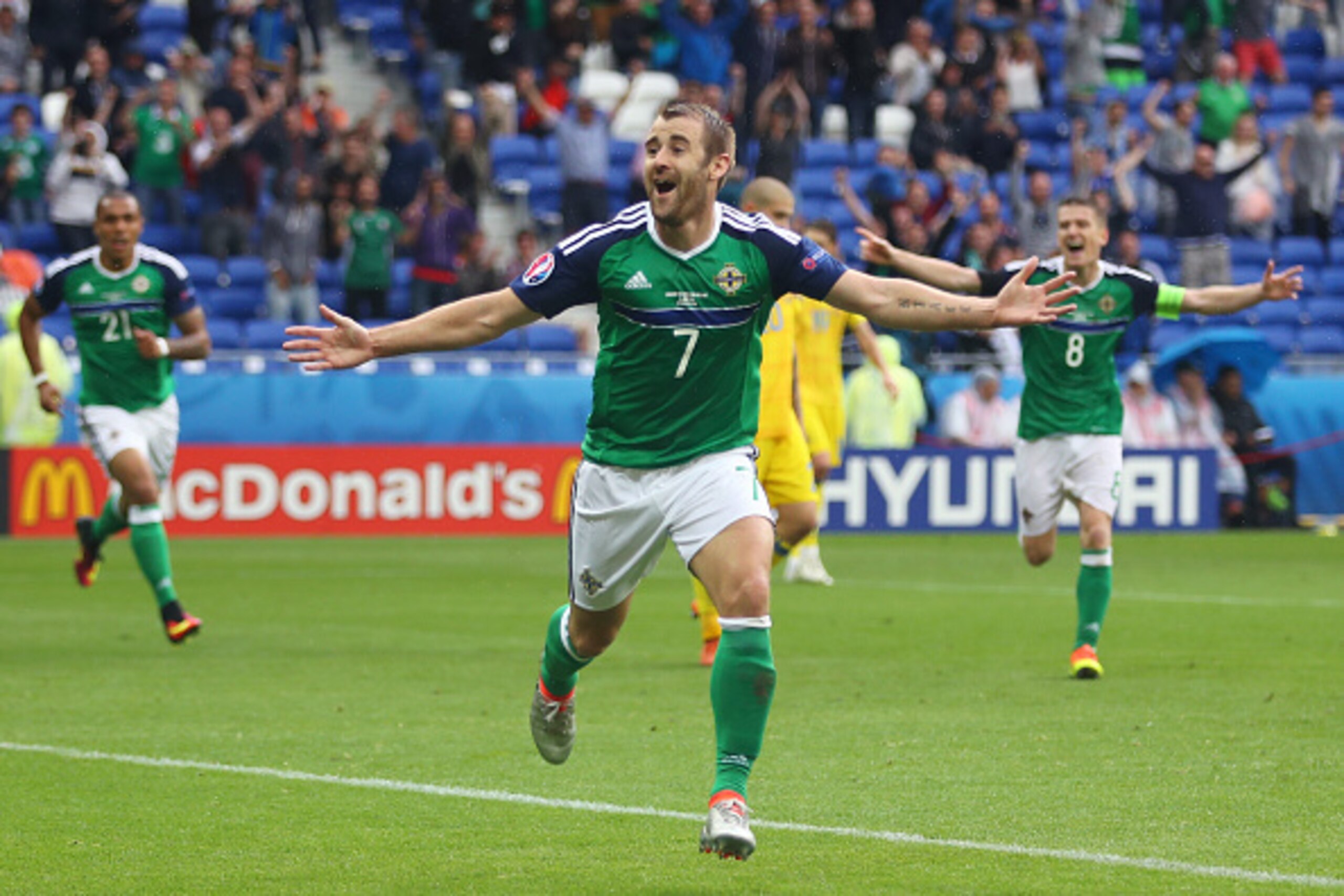 LYON, FRANCE - JUNE 16: Niall McGinn of Northern Ireland celebrates scoring his team's second goal during the UEFA EURO 2016 Group C match between Ukraine and Northern Ireland at Stade des Lumieres on June 16, 2016 in Lyon, France. (Photo by Clive Bruns LYON, FRANCE - JUNE 16: Niall McGinn of Northern Ireland celebrates scoring his team's second goal during the UEFA EURO 2016 Group C match between Ukraine and Northern Ireland at Stade des Lumieres on June 16, 2016 in Lyon, France. (Photo by Clive Bruns