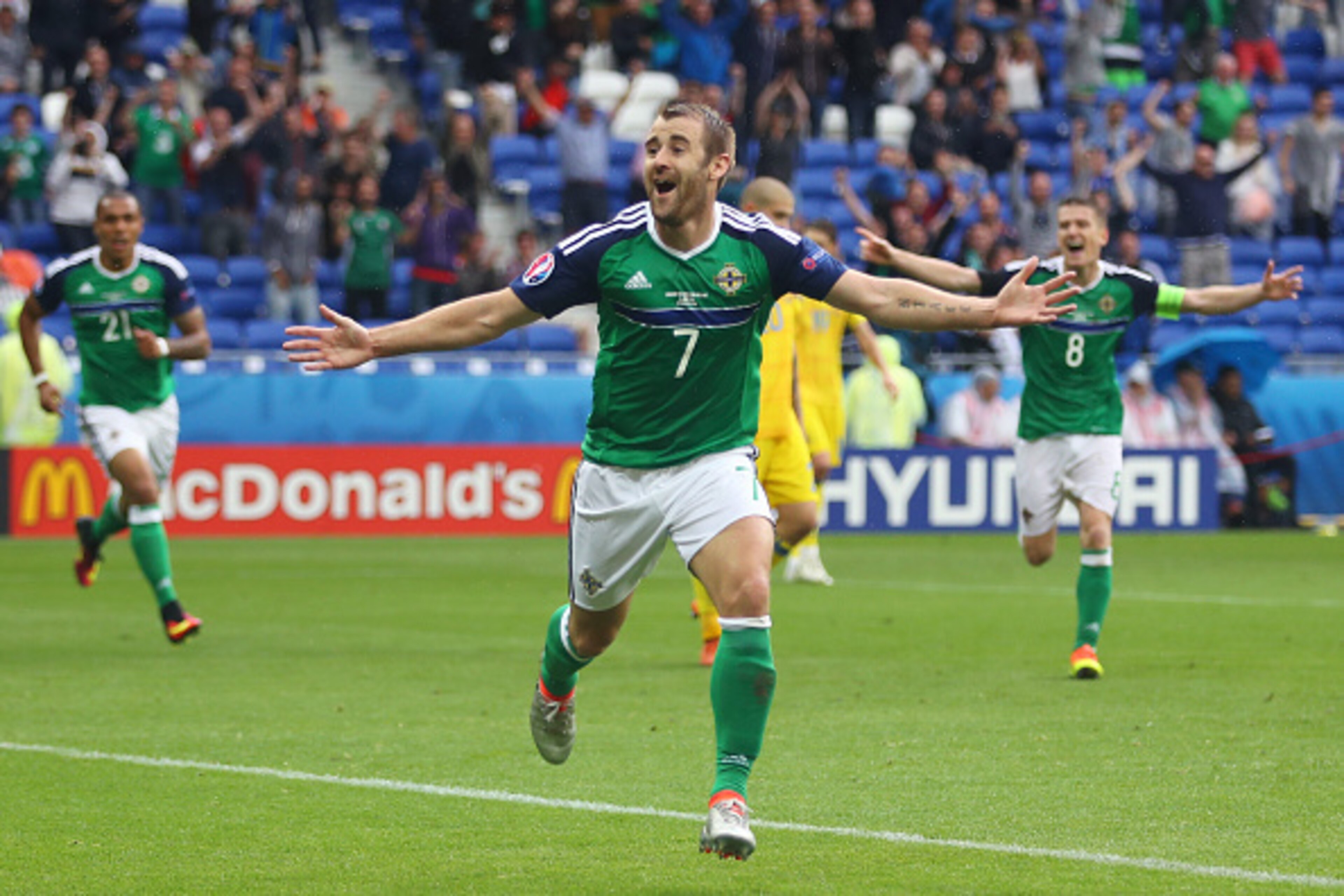LYON, FRANCE - JUNE 16: Niall McGinn of Northern Ireland celebrates scoring his team's second goal during the UEFA EURO 2016 Group C match between Ukraine and Northern Ireland at Stade des Lumieres on June 16, 2016 in Lyon, France. (Photo by Clive Bruns LYON, FRANCE - JUNE 16: Niall McGinn of Northern Ireland celebrates scoring his team's second goal during the UEFA EURO 2016 Group C match between Ukraine and Northern Ireland at Stade des Lumieres on June 16, 2016 in Lyon, France. (Photo by Clive Bruns