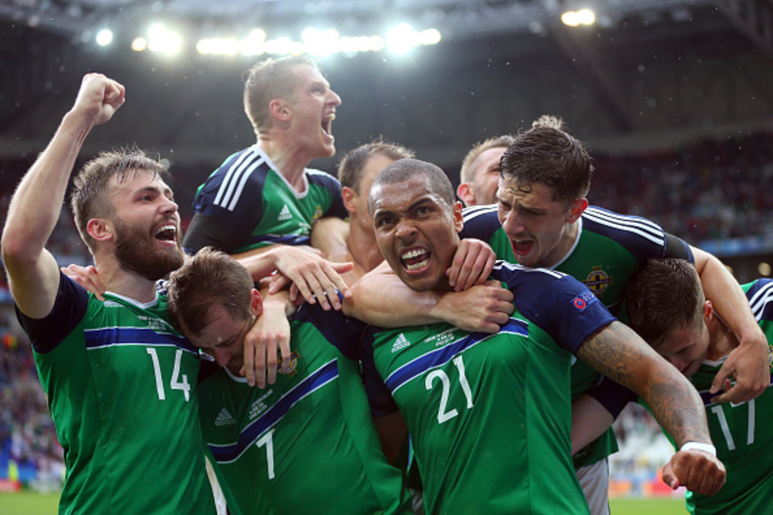 LYON, FRANCE - JUNE 16: Niall McGinn of Northern Ireland celebrates after he scores to make it 0-2 with his team mates during the UEFA EURO 2016 Group C match between Ukraine and Northern Ireland at Stade des Lumieres on June 16, 2016 in Lyon, France. (Ph