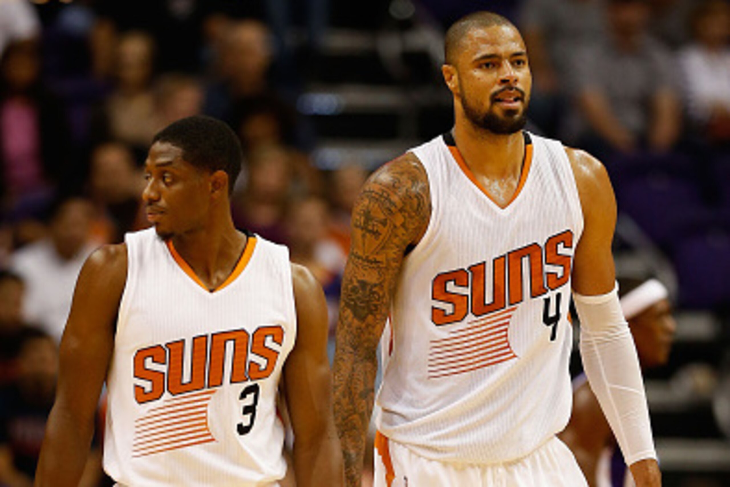 PHOENIX, AZ - OCTOBER 07:  Brandon Knight #3 and Tyson Chandler #4 of the Phoenix Suns walk the court during the first half ot he preseason NBA game against the Sacramento Kings at Talking Stick Resort Arena on October 7, 2015 in Phoenix, Arizona. NOTE TO