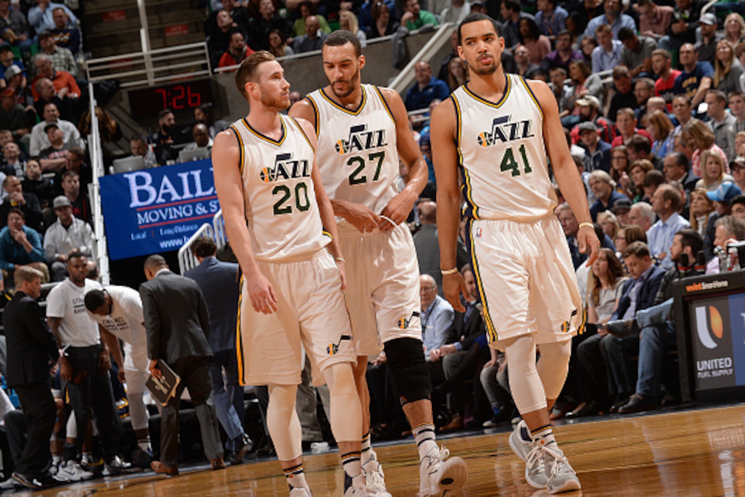 SALT LAKE CITY, UT - MARCH 30: Gordon Hayward #20, Rudy Gobert #27, and Trey Lyles #41 of the Utah Jazz chat during the game against the Golden State Warriors at Vivint Smart Home Arena on March 30, 2016 in Salt Lake City, Utah. NOTE TO USER: User express