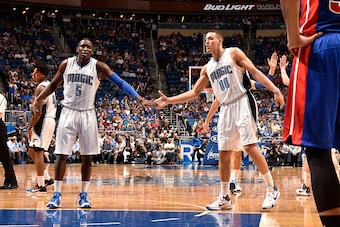 ORLANDO, FL - APRIL 6:  Victor Oladipo #5 of the Orlando Magic shakes hands with Aaron Gordon #00 of the Orlando Magic during the game against the Detroit Pistons on April 6, 2016 at Amway Center in Orlando, Florida. NOTE TO USER: User expressly acknowled