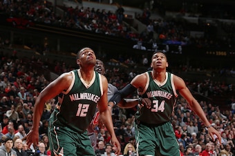 CHICAGO, IL - JANUARY 5:  Jabari Parker #12 of the Milwaukee Bucks and Giannis Antetokounmpo #34 of the Milwaukee Bucks box out against Tony Snell #20 of the Chicago Bulls on January 5, 2016 at the United Center in Chicago, Illinois. NOTE TO USER: User ex