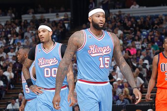 SACRAMENTO, CA - APRIL 9: Willie Cauley-Stein #00 and DeMarcus Cousins #15 of the Sacramento Kings look on during the game against the Oklahoma City Thunder on April 9, 2016 at Sleep Train Arena in Sacramento, California. NOTE TO USER: User expressly ackn