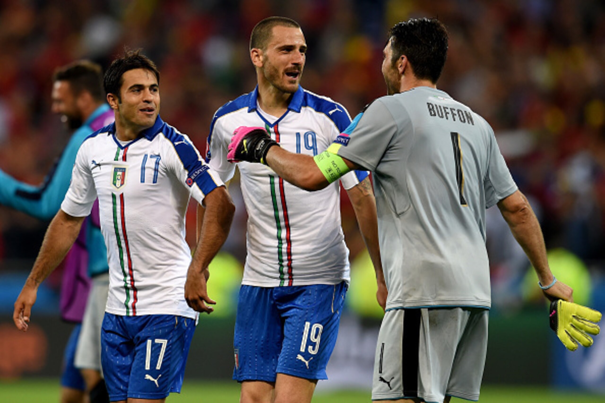 Gianluigi Buffon of Italy (R) celebrates his team's 2-0 win after the UEFA EURO 2016 Group E match between Belgium and Italy at Stade des Lumieres on June 13, 2016 in Lyon, France.