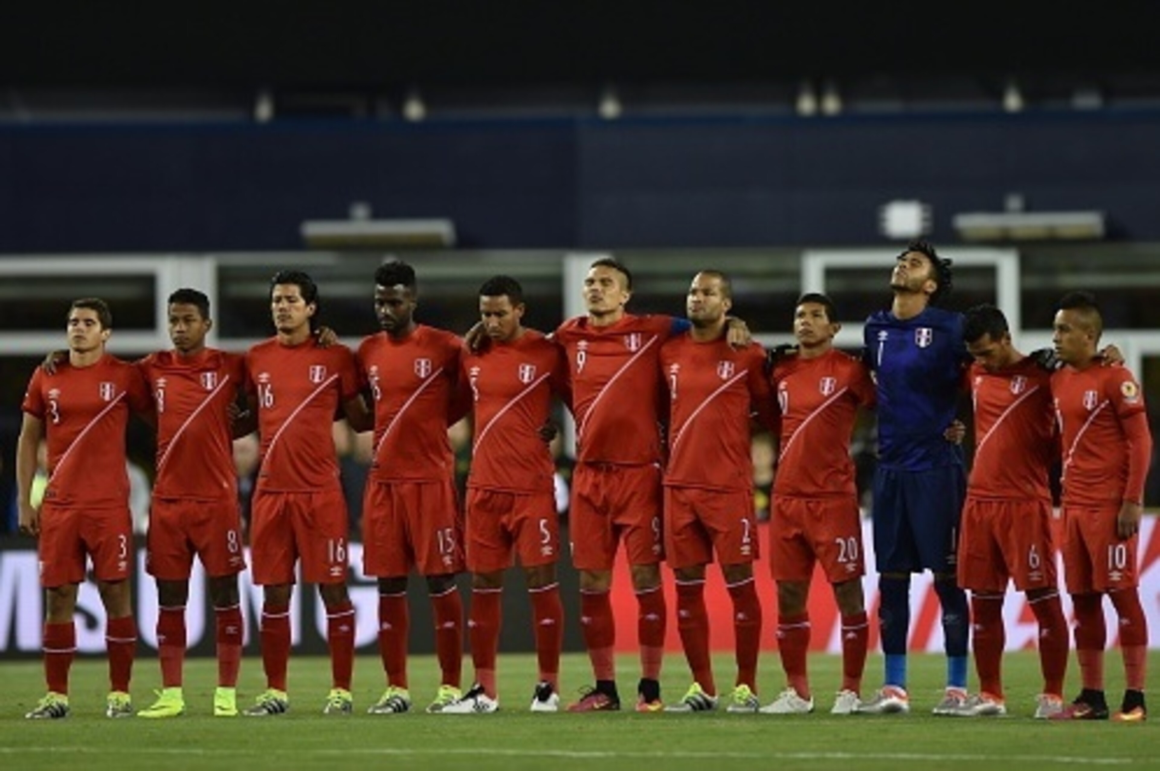 Players of Peru pay a minute of silence in honour of the victims of a rampage at a gay club in Orlando, Florida, that killed 50 people and wounded 53, before their Copa America Centenario football tournament match against Brazil in Foxborough, Massachuset