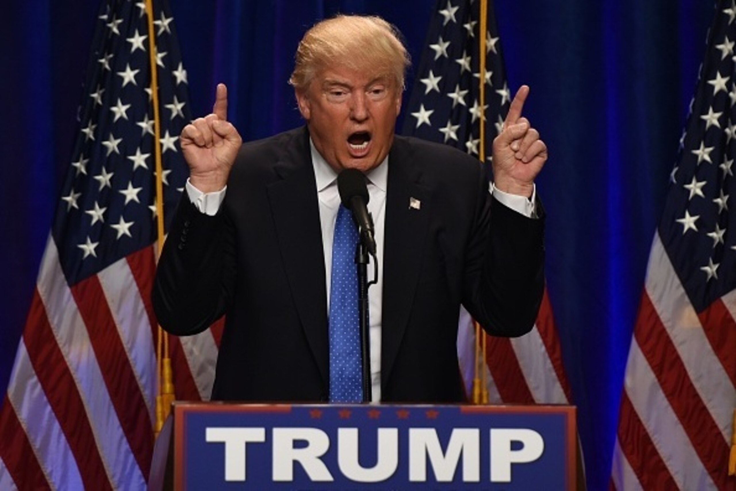 Republican presidential candidate Donald J. Trump speaks at the Saint Andelm College New Hampshire Institute of Politics in Manchester, New Hampshire June 13, 2016. / AFP / TIMOTHY A. CLARY        (Photo credit should read TIMOTHY A. CLARY/AFP/Getty Image