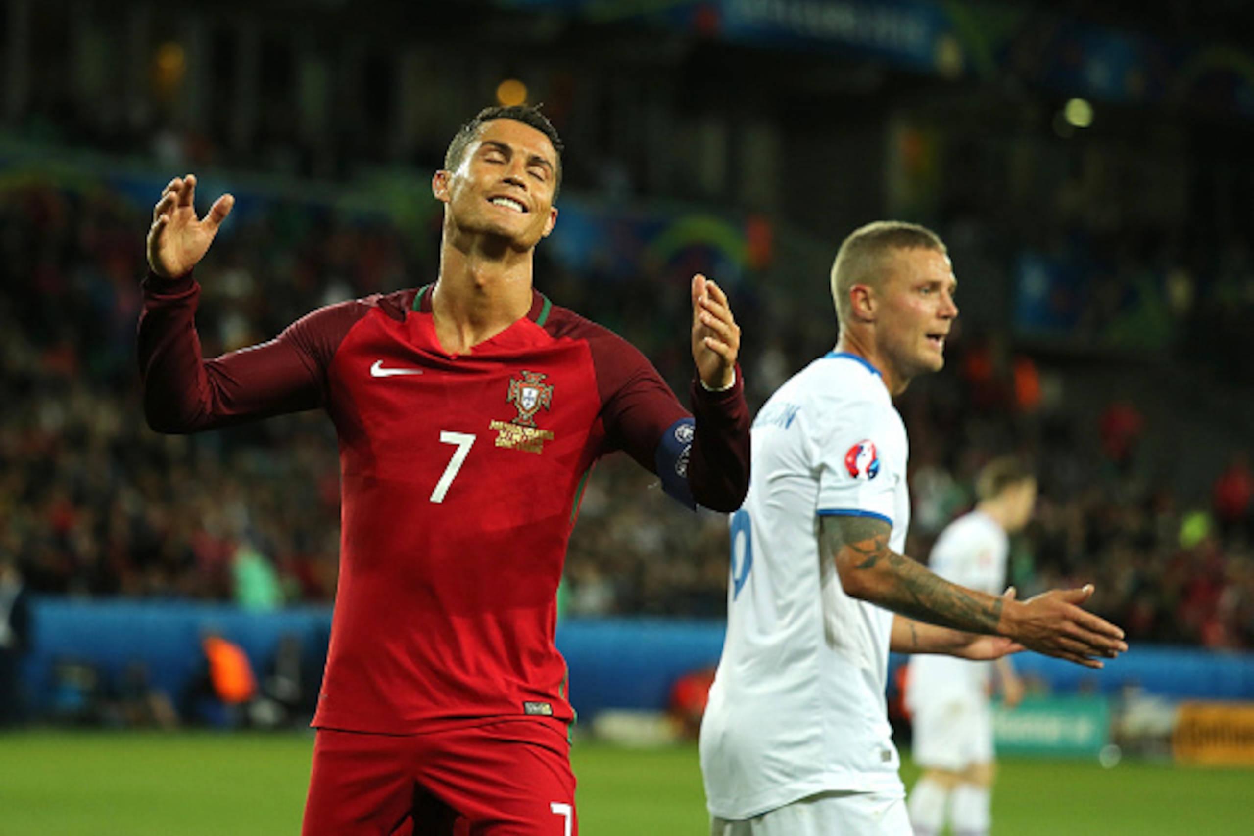 SAINT-ETIENNE, FRANCE - JUNE 14:  Cristiano Ronaldo of Portugal reacts to a missed chance during the UEFA EURO 2016 Group F match between Portugal and Iceland at Stade Geoffroy-Guichard on June 14, 2016 in Saint-Etienne, France.  (Photo by Matthew Ashton 