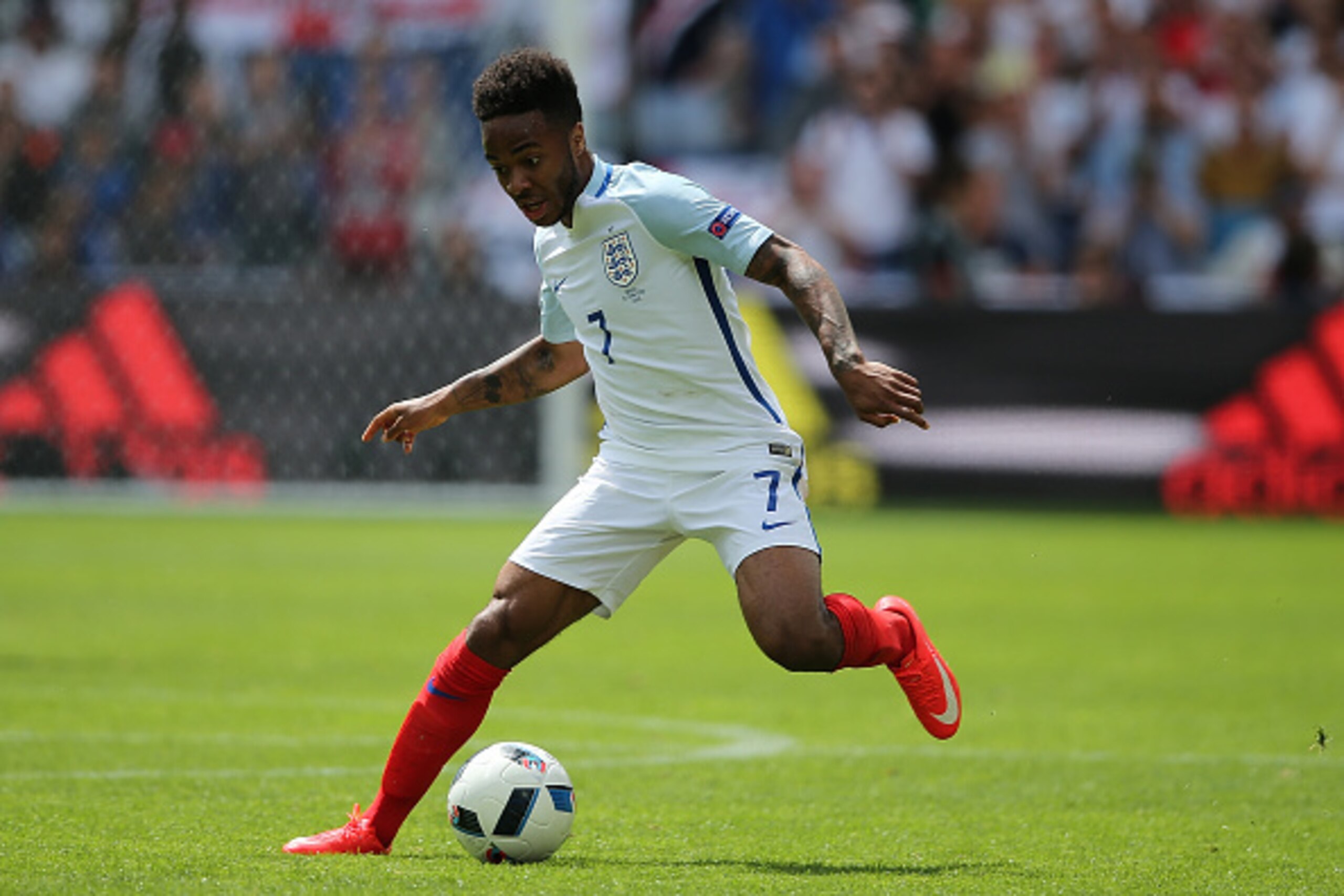 LENS, FRANCE - JUNE 16:  Raheem Sterling of England in action during the UEFA EURO 2016 Group B match between England v Wales at Stade Bollaert-Delelis on June 16, 2016 in Lens, France.  (Photo by Matthew Ashton - AMA/Getty Images)