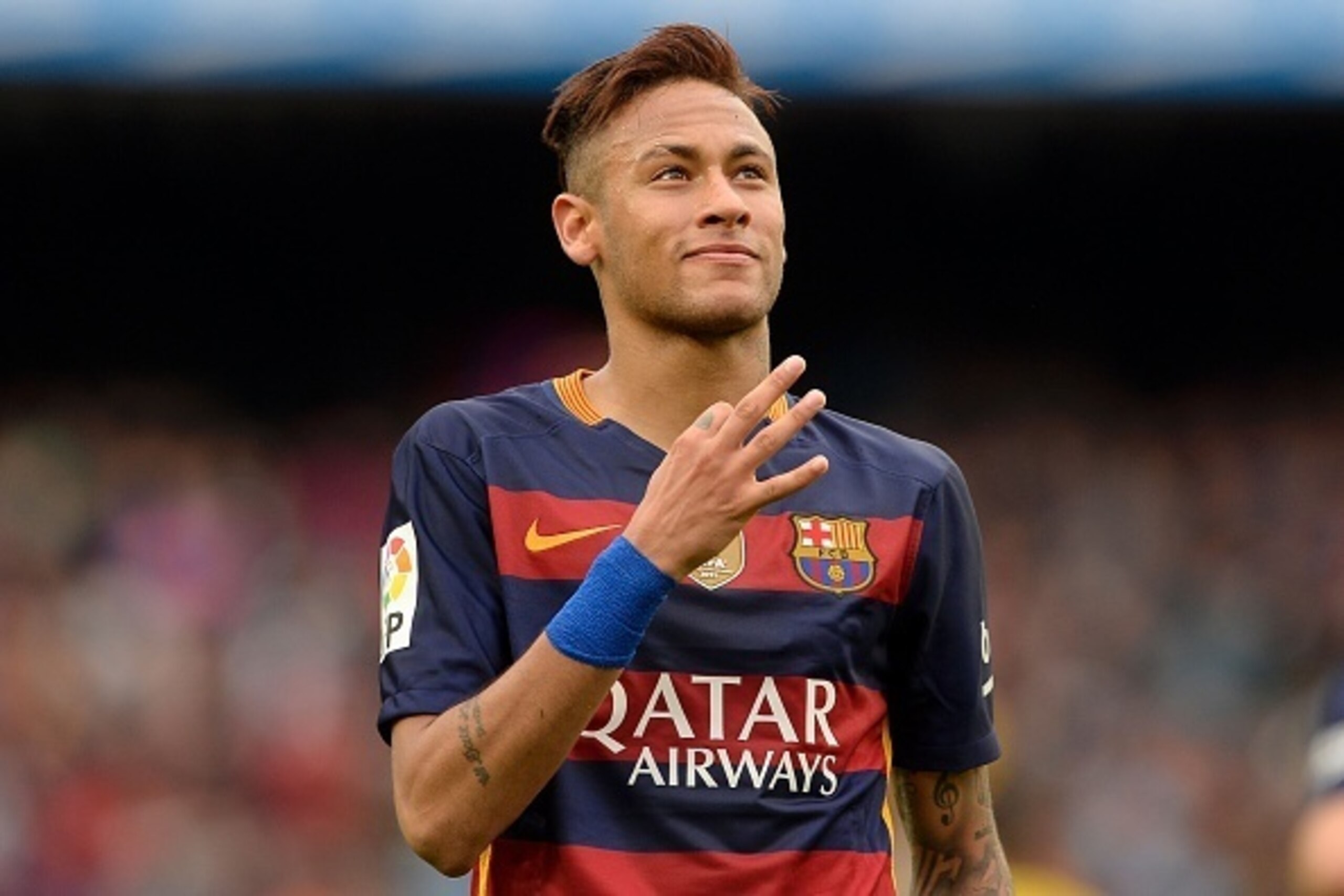 Barcelona's Brazilian forward Neymar celebrates his goal during the Spanish league football match FC Barcelona vs RCD Espanyol at the Camp Nou stadium in Barcelona on May 8, 2016.    / AFP / JOSEP LAGO        (Photo credit should read JOSEP LAGO/AFP/Getty