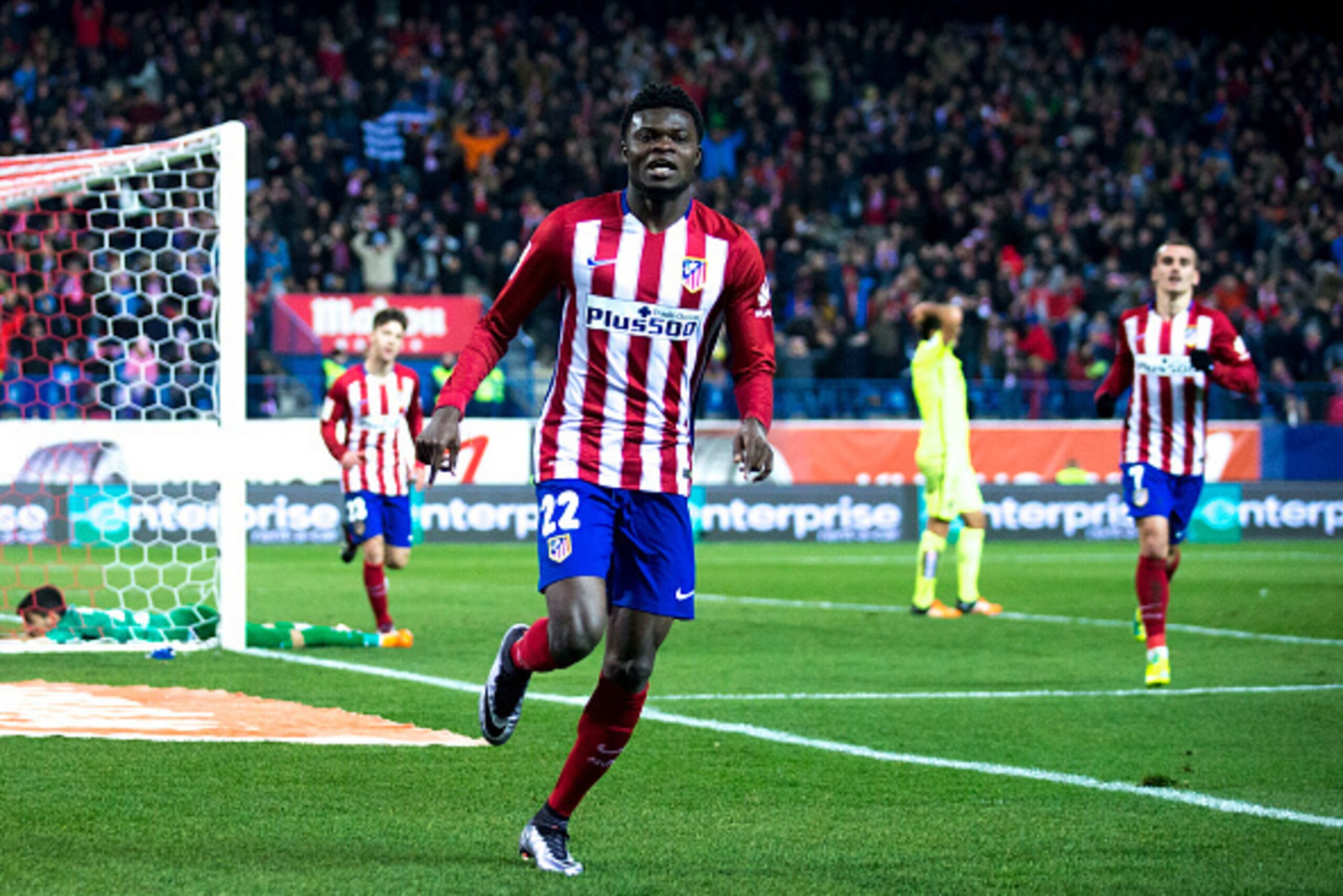 MADRID, SPAIN - JANUARY 02:  Thomas Teye Partey of Atletico de Madrid celebrates scoring their opening goal during the La Liga match between Club Atletico de Madrid and Levante UD at Vicente Calderon Stadium on January 2, 2016 in Madrid, Spain.  (Photo by