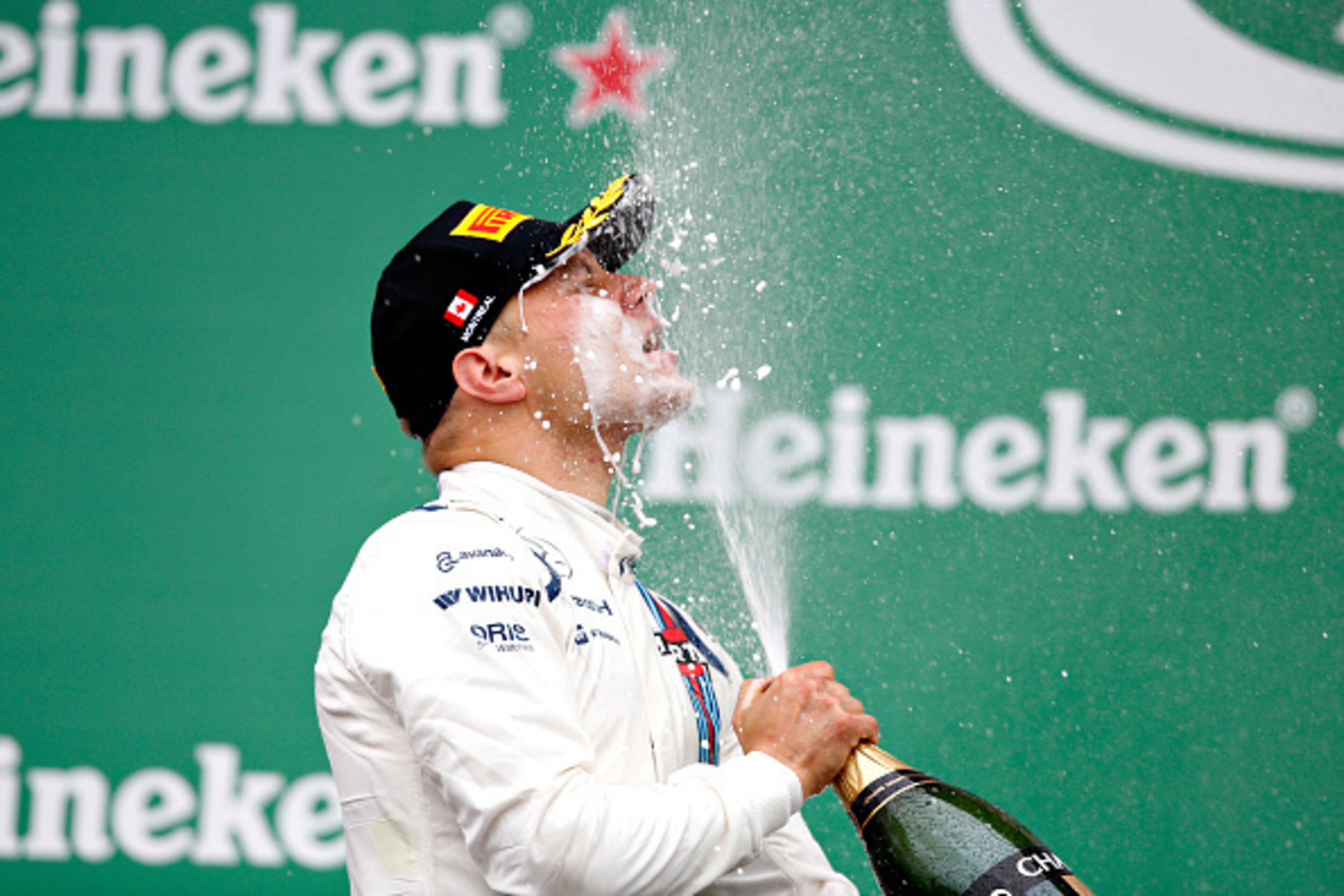 MONTREAL, QC - JUNE 12: Valtteri Bottas of Finland and Williams celebrates on the podium during the Canadian Formula One Grand Prix at Circuit Gilles Villeneuve on June 12, 2016 in Montreal, Canada. (Photo by Charles Coates/Getty Images) MONTREAL, QC - JUNE 12: Valtteri Bottas of Finland and Williams celebrates on the podium during the Canadian Formula One Grand Prix at Circuit Gilles Villeneuve on June 12, 2016 in Montreal, Canada. (Photo by Charles Coates/Getty Images)