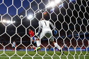 NICE, FRANCE - JUNE 17:  Alvaro Morata of Spain heads the ball past Volkan Babacan of Turkey to score his sides first goal during the UEFA EURO 2016 Group D match between Spain and Turkey at Allianz Riviera Stadium on June 17, 2016 in Nice, France.  (Phot