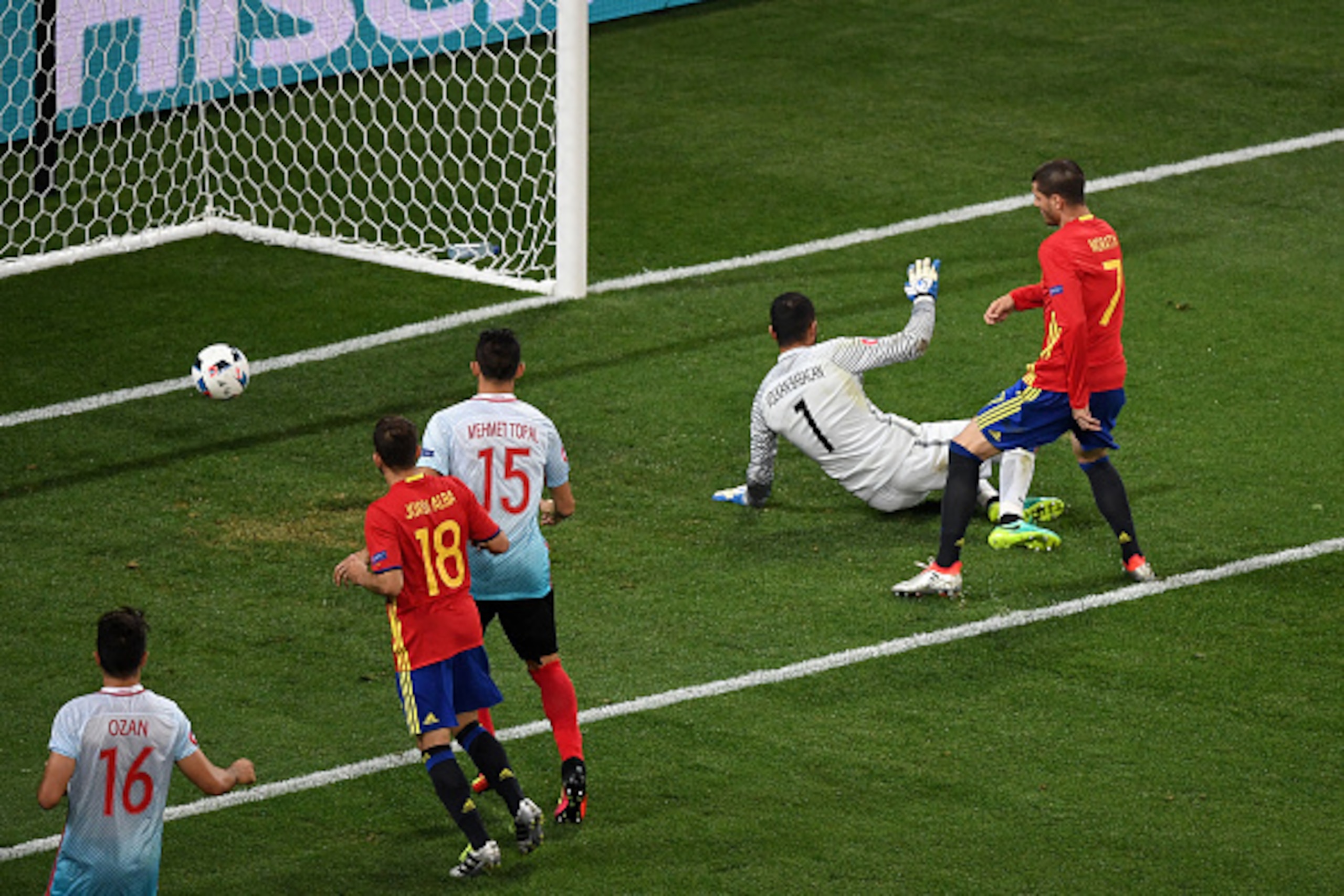 NICE, FRANCE - JUNE 17:  Alvaro Morata of Spain scores his sides third and his second goal past Volkan Babacan of Turkey during the UEFA EURO 2016 Group D match between Spain and Turkey at Allianz Riviera Stadium on June 17, 2016 in Nice, France.  (Photo 