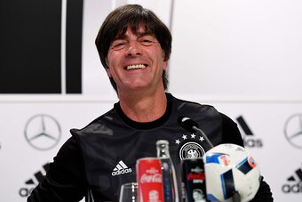 Germany's head coach Joachim Loew smiles while holding a press conference in Evian-Les-Bains on June 18, 2016 during the Euro 2016 football tournament. / AFP / PATRIK STOLLARZ        (Photo credit should read PATRIK STOLLARZ/AFP/Getty Images)