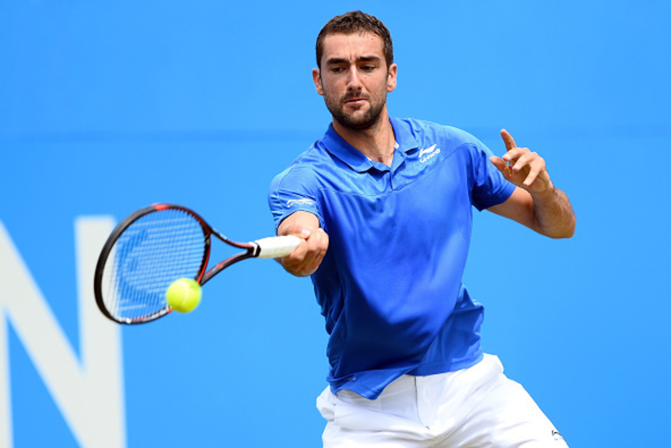 LONDON, ENGLAND - JUNE 17: Marin Cilic of Croatia hits a forehand during the quarter final match against Steve Johnson of the United States on day 5 at Queens Club on June 17, 2017 in London, England. (Photo by Patrik Lundin/Getty Images for LTA)