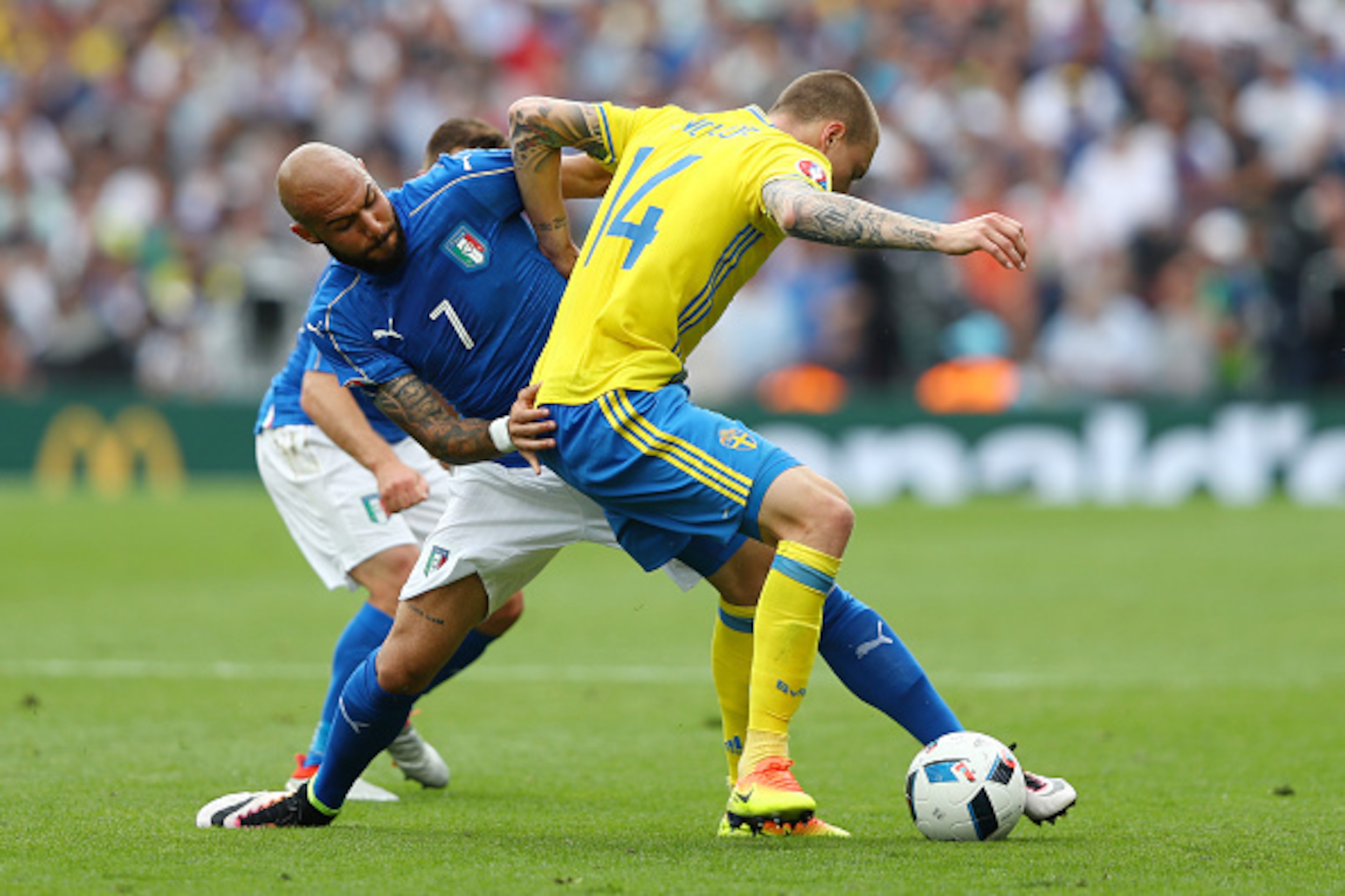TOULOUSE, FRANCE - JUNE 17: Simone Zaza of Italy tackles Victor Lindelof of Sweden during the UEFA EURO 2016 Group E match between Italy and Sweden at Stadium Municipal on June 17, 2016 in Toulouse, France. (Photo by Dean Mouhtaropoulos/Getty Images) TOULOUSE, FRANCE - JUNE 17: Simone Zaza of Italy tackles Victor Lindelof of Sweden during the UEFA EURO 2016 Group E match between Italy and Sweden at Stadium Municipal on June 17, 2016 in Toulouse, France. (Photo by Dean Mouhtaropoulos/Getty Images)