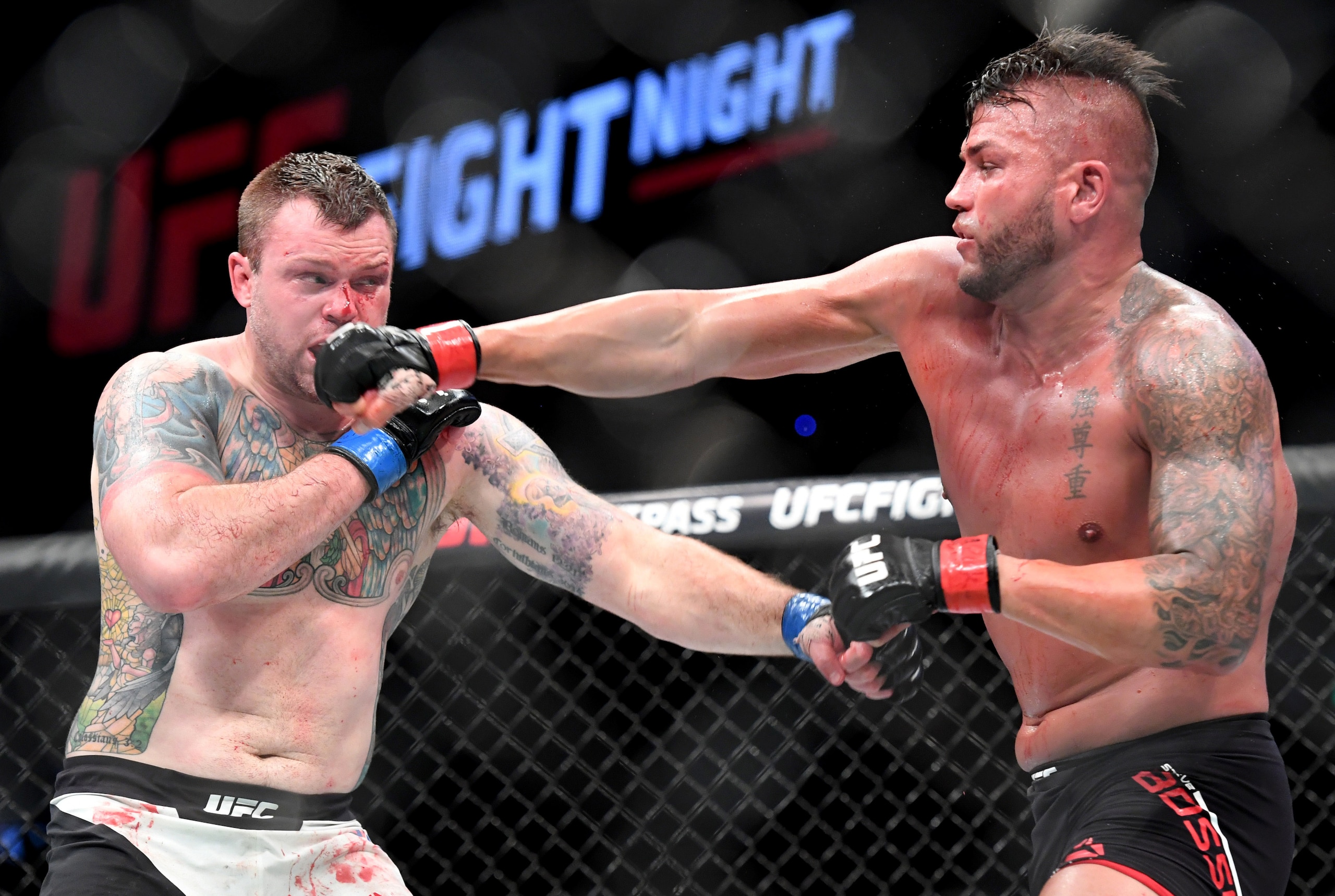 Jun 18, 2016; Ottawa, Ontario, Canada; Sean O'Connell (blue gloves) fights Steve Bosse (red gloves) in a light heavyweight bout during UFC Fight Night at TD Place Arena. Mandatory Credit: Marc DesRosiers-USA TODAY Sports Jun 18, 2016; Ottawa, Ontario, Canada; Sean O'Connell (blue gloves) fights Steve Bosse (red gloves) in a light heavyweight bout during UFC Fight Night at TD Place Arena. Mandatory Credit: Marc DesRosiers-USA TODAY Sports