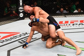 OTTAWA, ON - JUNE 18:   Donald Cerrone (top) of the United States attempts to submit Patrick Cote of Canada in their welterweight bout during the UFC Fight Night event inside the TD Place Arena on June 18, 2016 in Ottawa, Ontario, Canada. (Photo by Jeff B