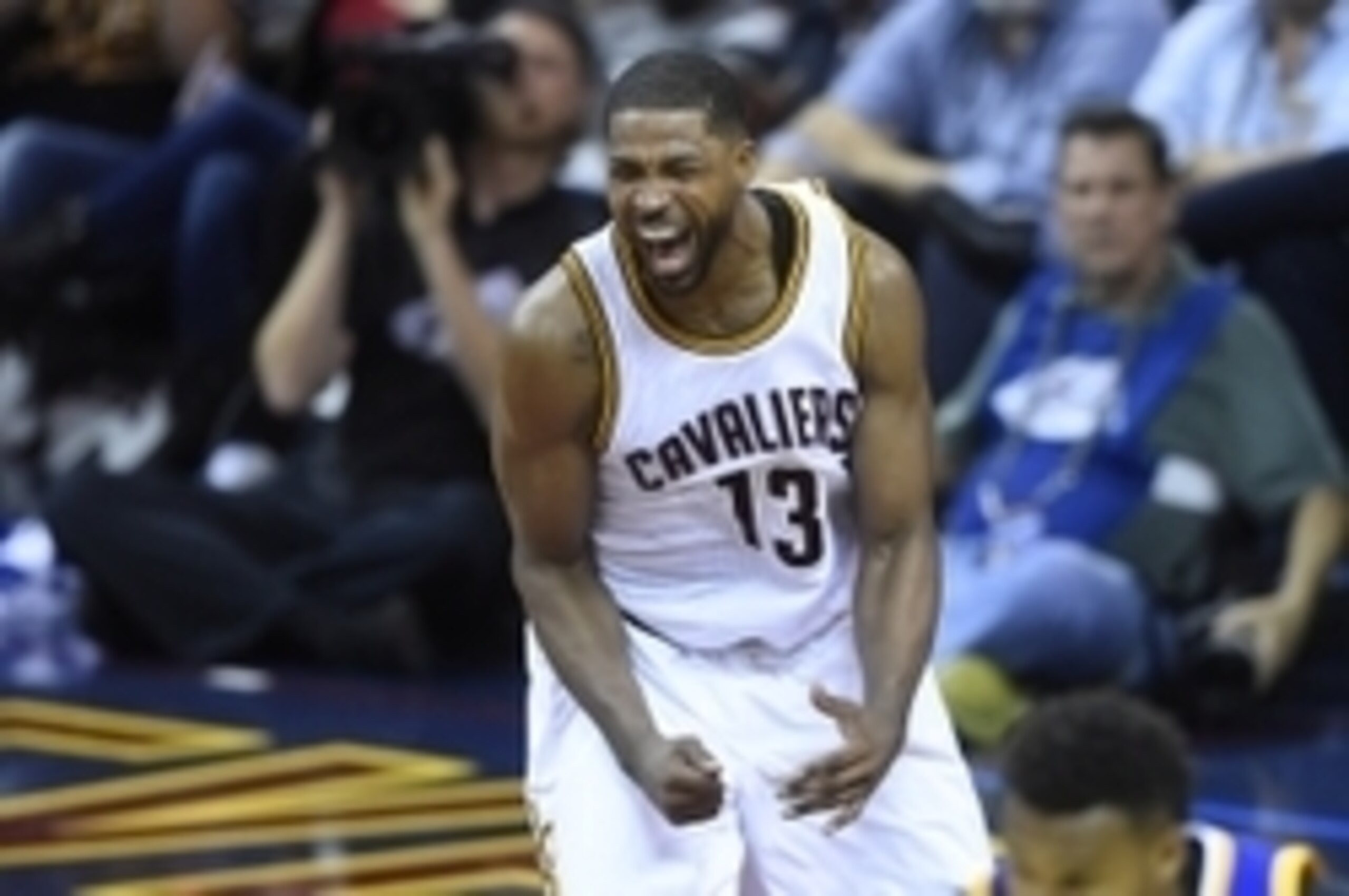 Jun 16, 2016; Cleveland, OH, USA; Cleveland Cavaliers center Tristan Thompson (13) reacts after dunking the ball against the Golden State Warriors during the fourth quarter in game six of the NBA Finals at Quicken Loans Arena. Mandatory Credit: David Rich