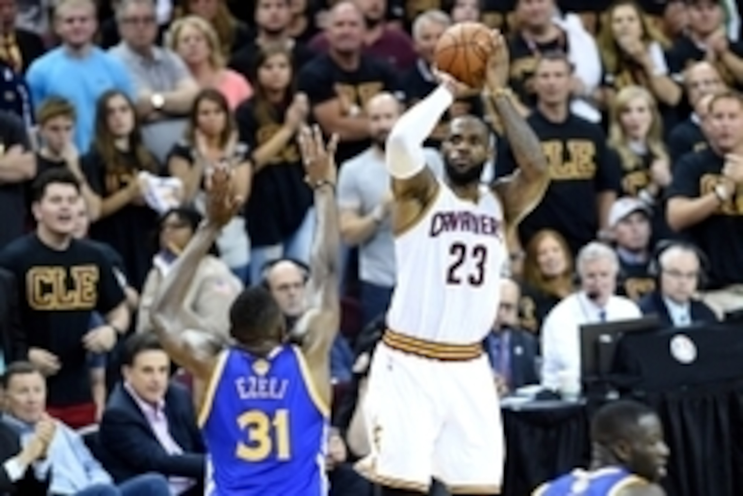Jun 16, 2016; Cleveland, OH, USA; Cleveland Cavaliers forward LeBron James (23) shoots the ball against Golden State Warriors center Festus Ezeli (31) during the third quarter in game six of the NBA Finals at Quicken Loans Arena. Mandatory Credit: Bob Don