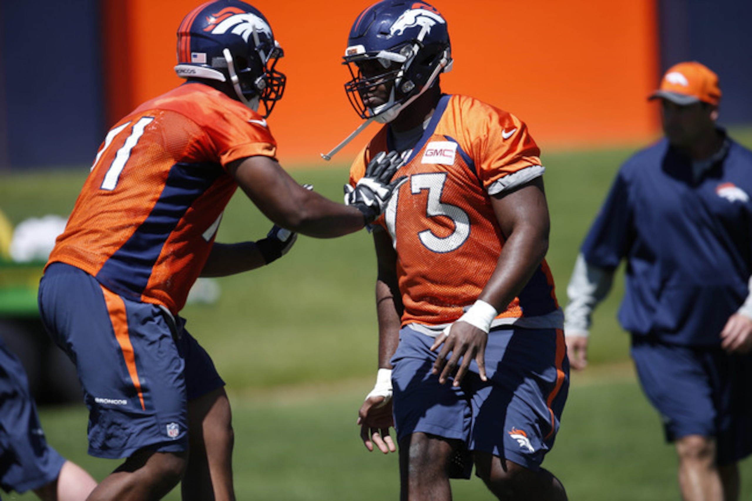 RT Donald Stephenson (left) and LT Russell Okung