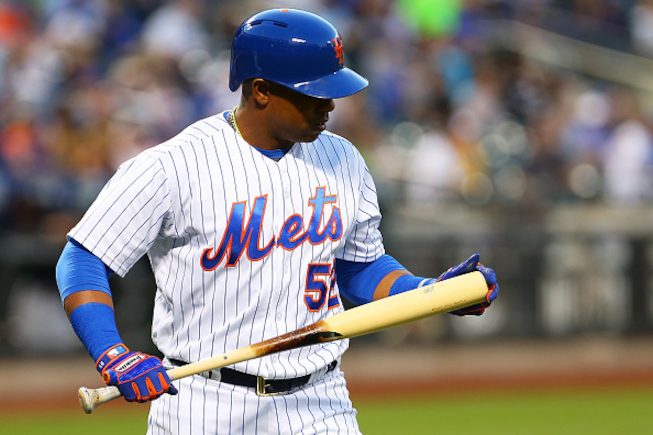 NEW YORK, NEW YORK - JUNE 17: Yoenis Cespedes #52 of the New York Mets reacts after striking out in the fifth inning against the Atlanta Braves  at Citi Field on June 17, 2016 in the Flushing neighborhood of the Queens borough of New York City.  (Photo by