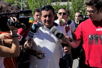 Representative for Barcelona's Swedish forward Zlatan Ibrahimovic, Mino Raiola (C), arrives  at the offices of Barcelona FC allegedly to sign Ibrahimovic, in Barcelona on August 26, 2010.  Swedish forward Zlatan Ibrahimovic revealed that his Barcelona bos
