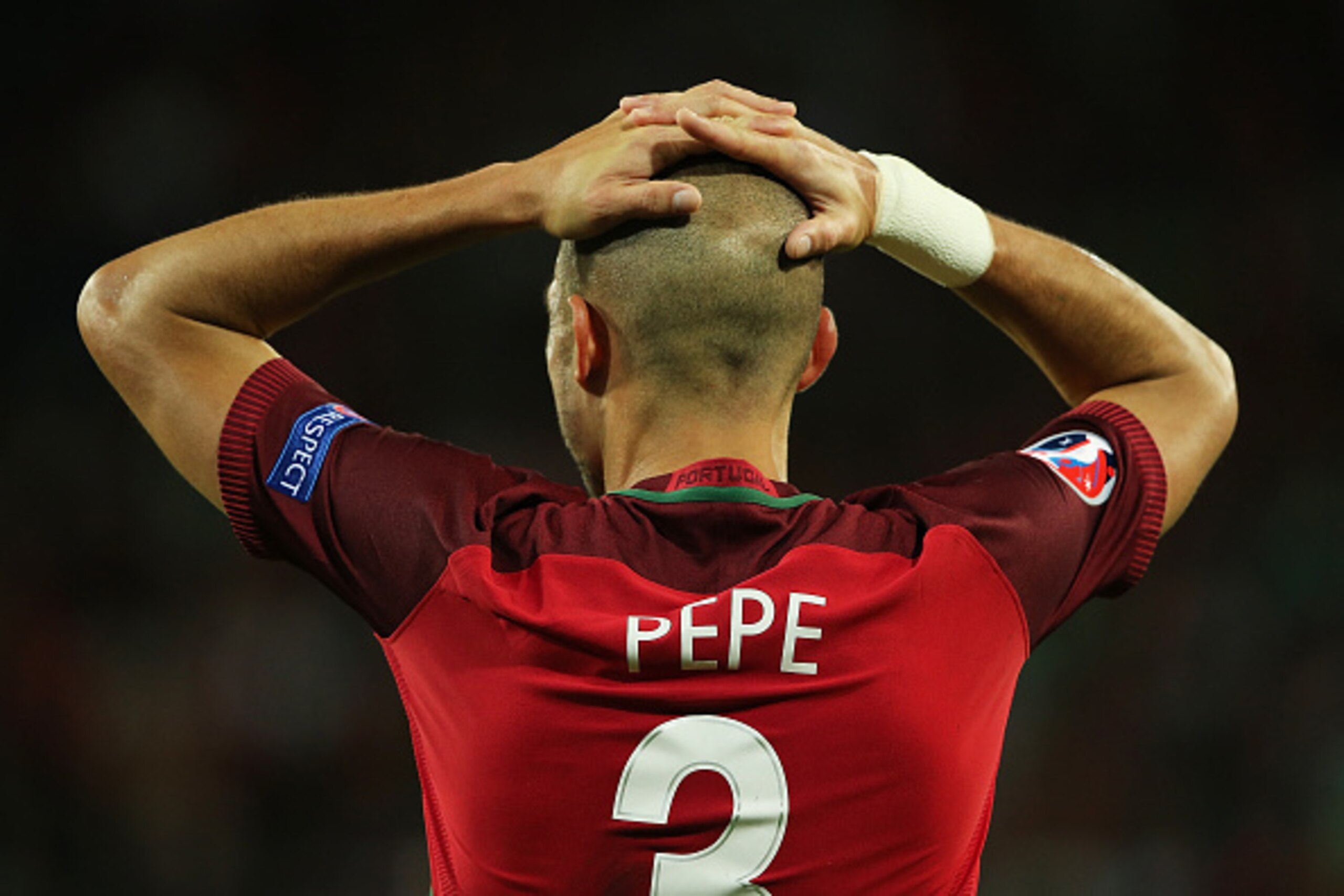 SAINT-ETIENNE, FRANCE - JUNE 14:  Pepe of Portugal reacts during the UEFA EURO 2016 Group F match between Portugal and Iceland at Stade Geoffroy-Guichard on June 14, 2016 in Saint-Etienne, France.  (Photo by Matthew Ashton - AMA/Getty Images)
