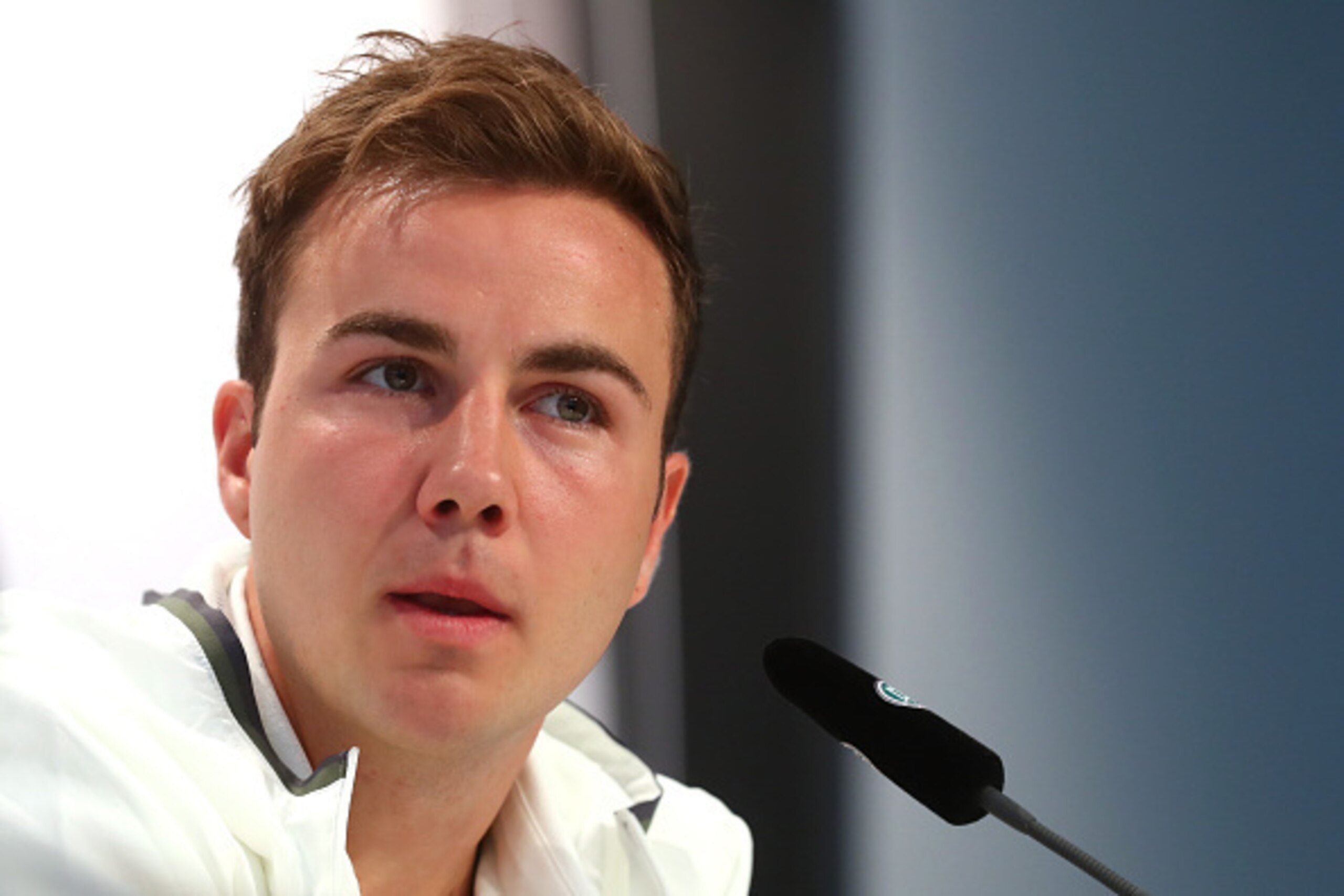 EVIAN-LES-BAINS, FRANCE - JUNE 19:  Mario Goetze of Germany talks to the media during a Germany press conference at Ermitage Evian on June 19, 2016 in Evian-les-Bains, France.  (Photo by Alexander Hassenstein/Getty Images)