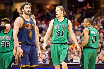 CLEVELAND, OH - FEBRUARY 5: Kevin Love #0 of the Cleveland Cavaliers and Kelly Olynyk #41 of the Boston Celtics pause on the court during the first half at Quicken Loans Arena on February 5, 2016 in Cleveland, Ohio. NOTE TO USER: User expressly acknowledg
