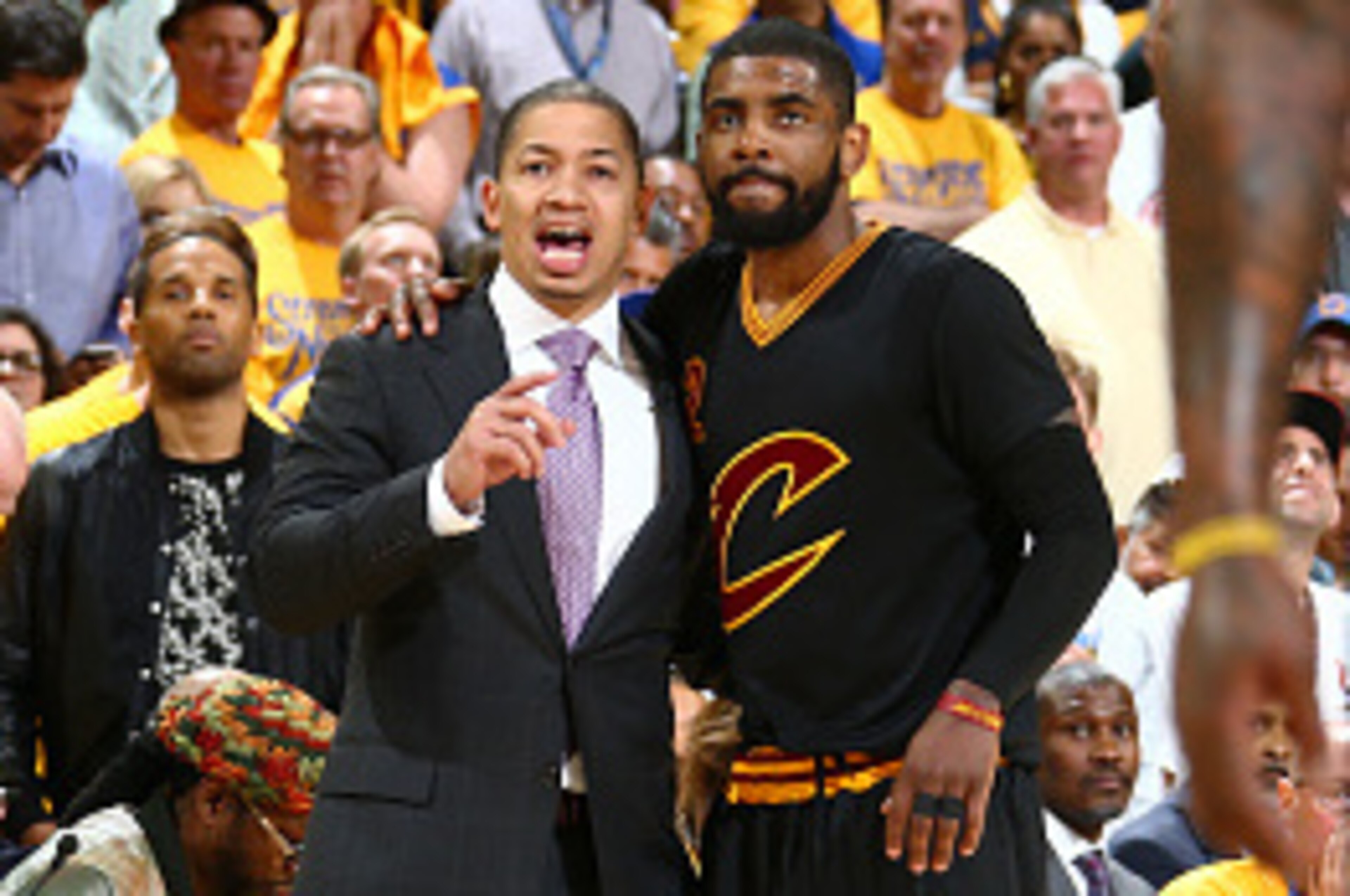 OAKLAND, CA - JUNE 13:  Head Coach Tyronn Lue of the Cleveland Cavaliers talks with Kyrie Irving #2 of the Cavaliers during the game against the Golden State Warriors in Game Five of the 2016 NBA Finals on June 13, 2016 at Oracle Arena in Oakland, Califor