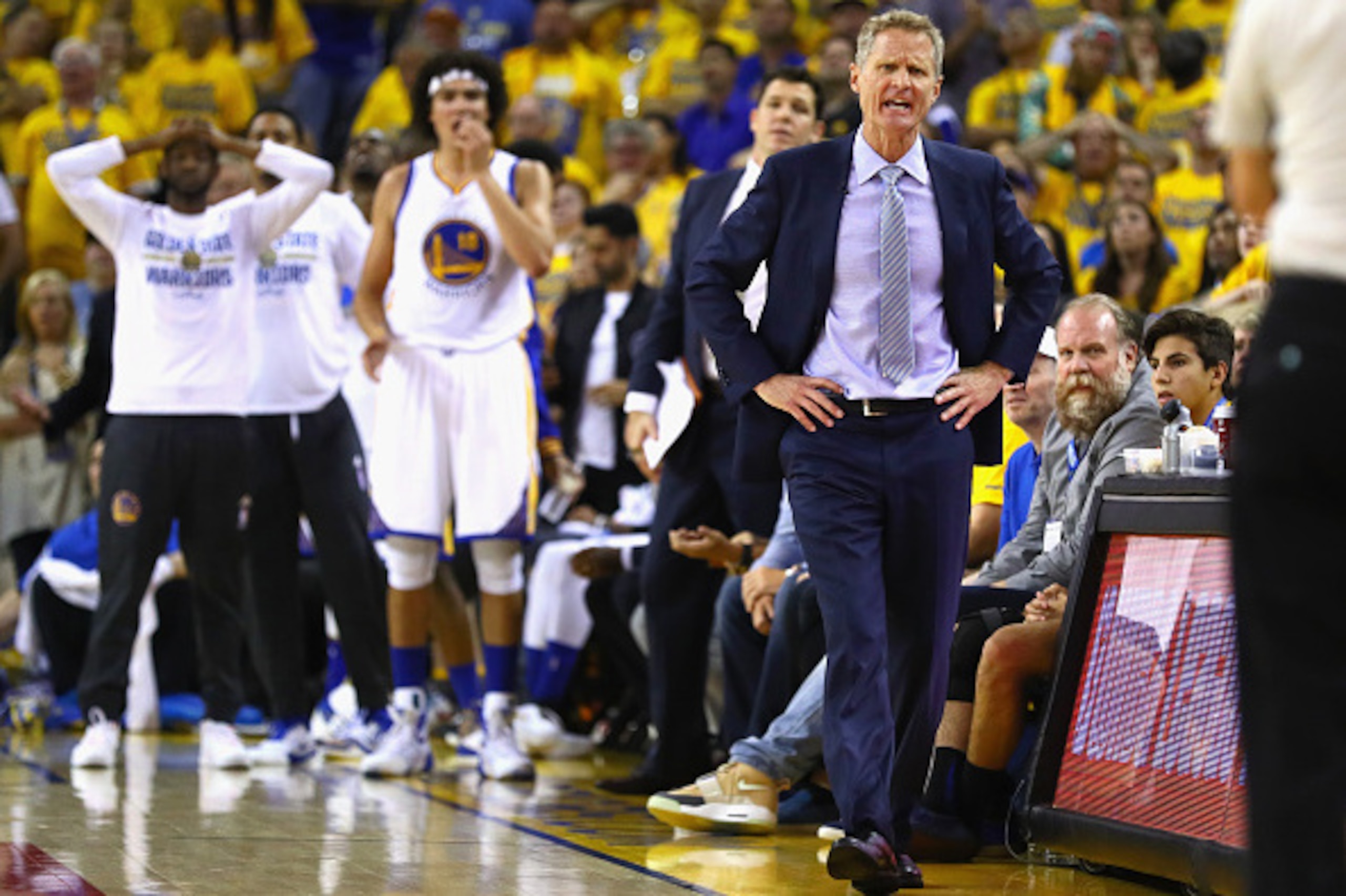 OAKLAND, CA - JUNE 19:  Head coach Steve Kerr of the Golden State Warriors and the Golden State Warriors bench react during the first half against the Cleveland Cavaliers in Game 7 of the 2016 NBA Finals at ORACLE Arena on June 19, 2016 in Oakland, Califo