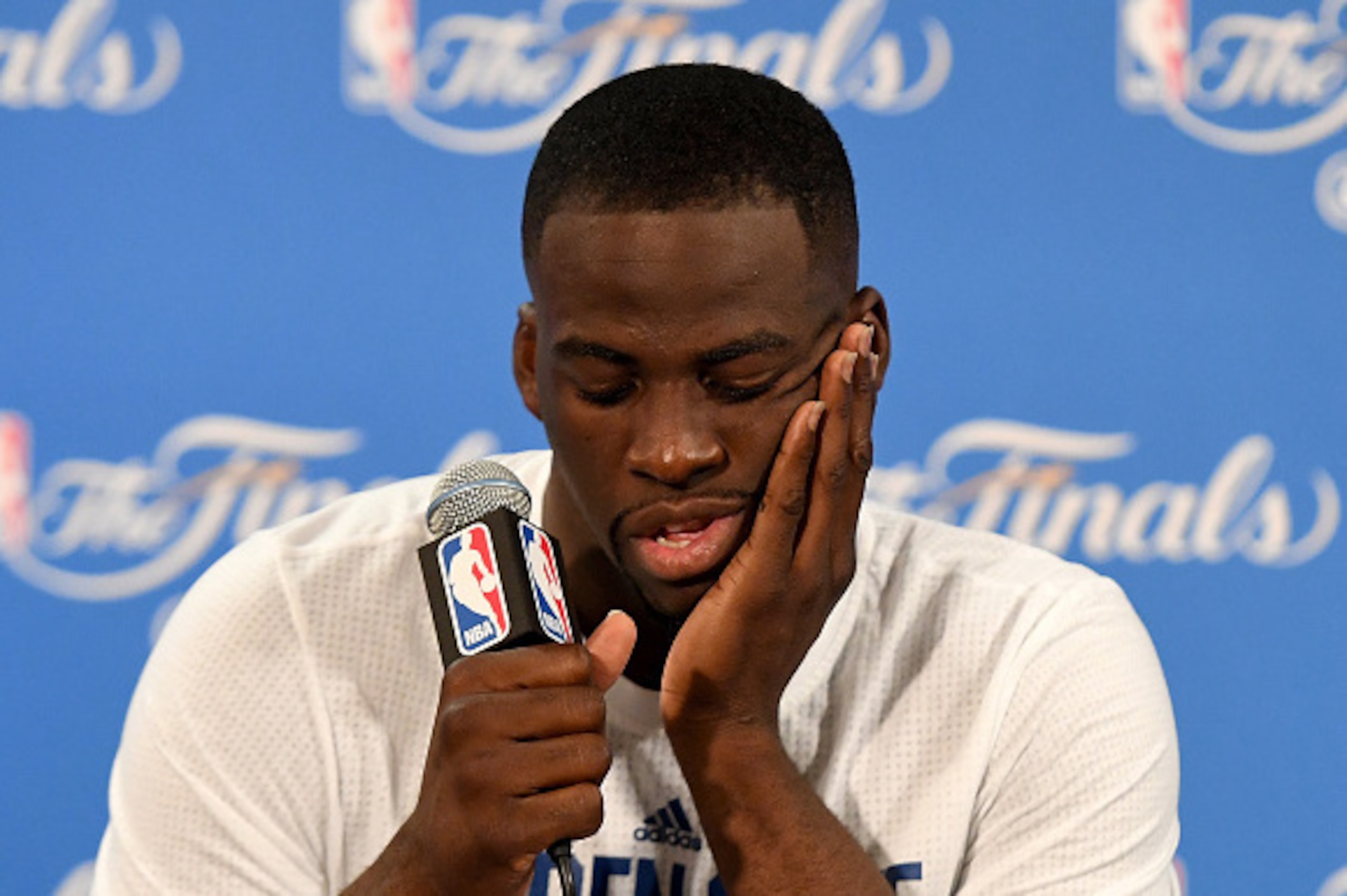 OAKLAND, CA - JUNE 19:  Draymond Green #23 of the Golden State Warriors speaks to members of the media after being defeated by the Cleveland Cavaliers in Game 7 of the 2016 NBA Finals at ORACLE Arena on June 19, 2016 in Oakland, California. NOTE TO USER: 