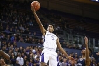 Nov 19, 2015; Seattle, WA, USA; Washington Huskies guard Dejounte Murray (5) shoots the ball against the Mount St. Mary's Mountaineers during the second half at Alaska Airlines Arena. The Huskies won 100-67. Mandatory Credit: Joe Nicholson-USA TODAY Sport