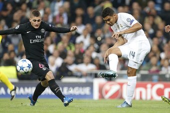 MADRID, SPAIN - NOVEMBER 3: Casemiro of Real Madrid and Marco Verratti of PSG (left) in action during the UEFA Champions League match between Real Madrid and Paris Saint-Germain (PSG) at Santiago Bernabeu stadium on November 3, 2015 in Madrid, Spain. (Pho